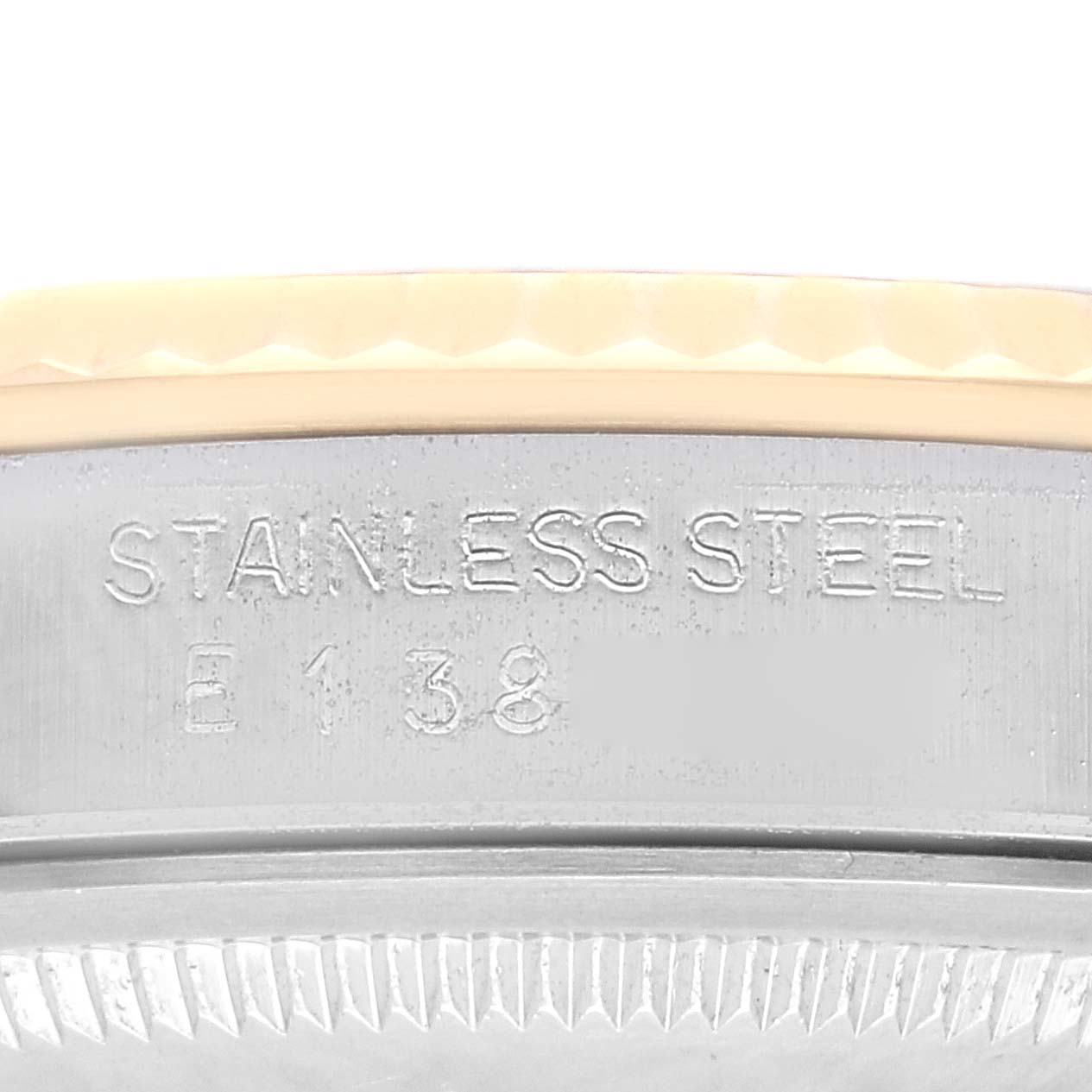 The close-up image shows the stainless steel case with engraving of the Rolex Datejust 16233 Men's Steel and Gold (two tone) Champagne Dial 16233 Men's Steel and Gold (two tone) Champagne Dial watch.