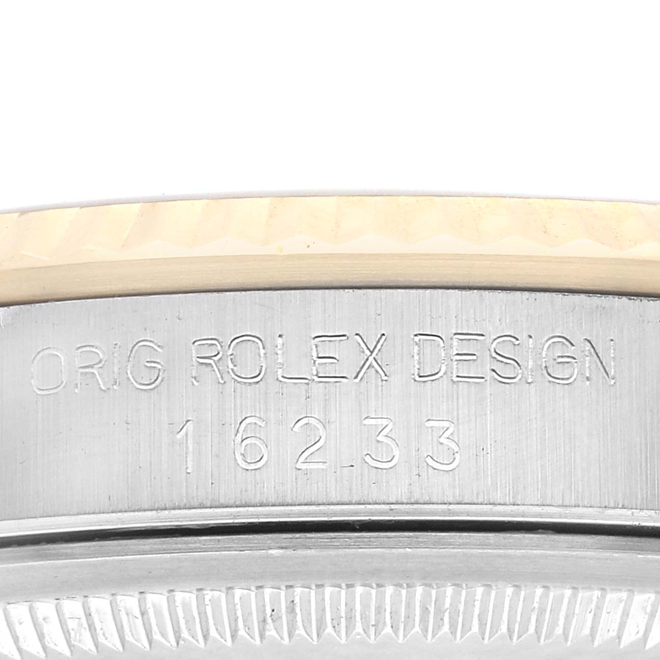 This image shows a close-up of the case engraving on a Rolex Datejust 16233 Men's Steel and Gold (two tone) Champagne Dial 16233 Men's Steel and Gold (two tone) Champagne Dial watch, displaying the model number "162.33."