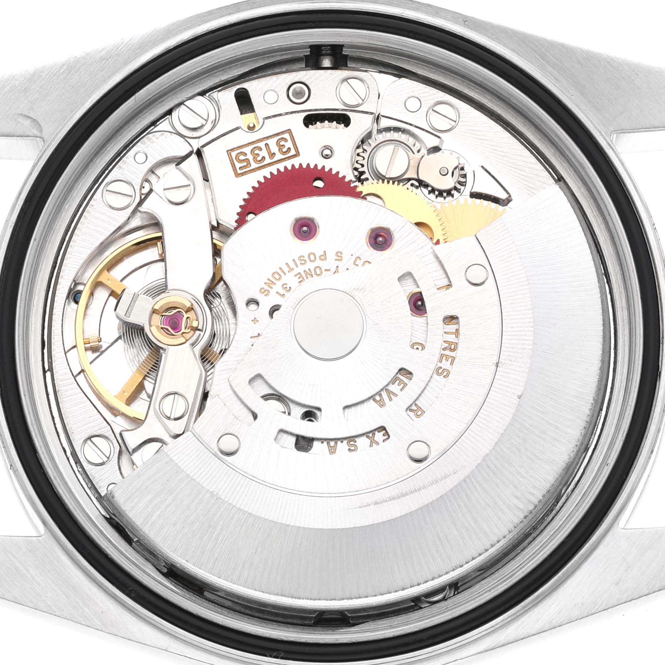 The image shows the internal mechanisms of a Rolex Datejust 16233 Men's Steel and Gold (two tone) Champagne Dial 16233 Men's Steel and Gold (two tone) Champagne Dial watch, viewed from the case back.