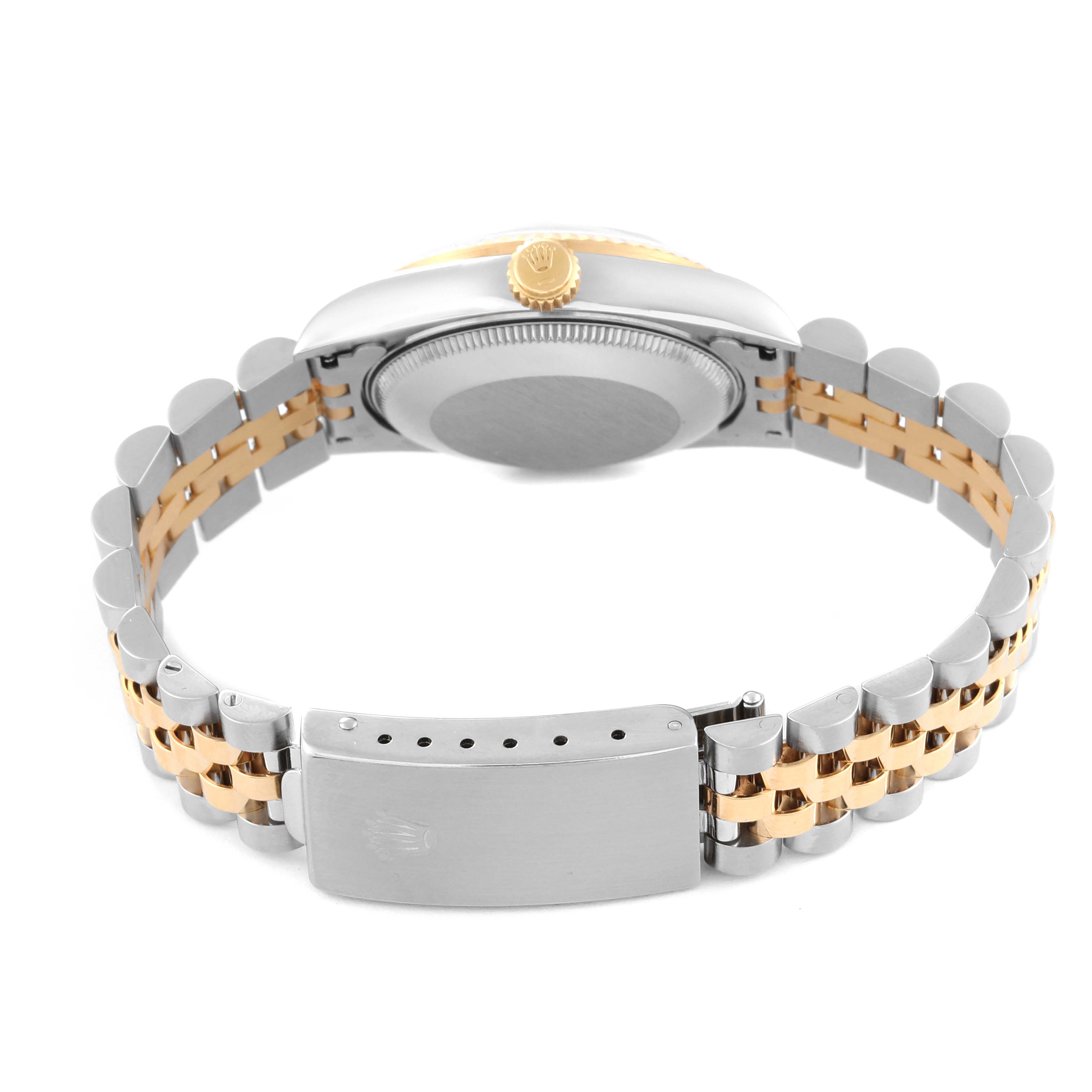 This image shows the back of a Rolex Mid-Size 68273 Women
s Steel and Gold (two tone) Mother of Pearl Dial 68273 Women
s Steel and Gold (two tone) Mother of Pearl Dial model watch, featuring its case back, crown, and two-tone jubilee bracelet with clasp.