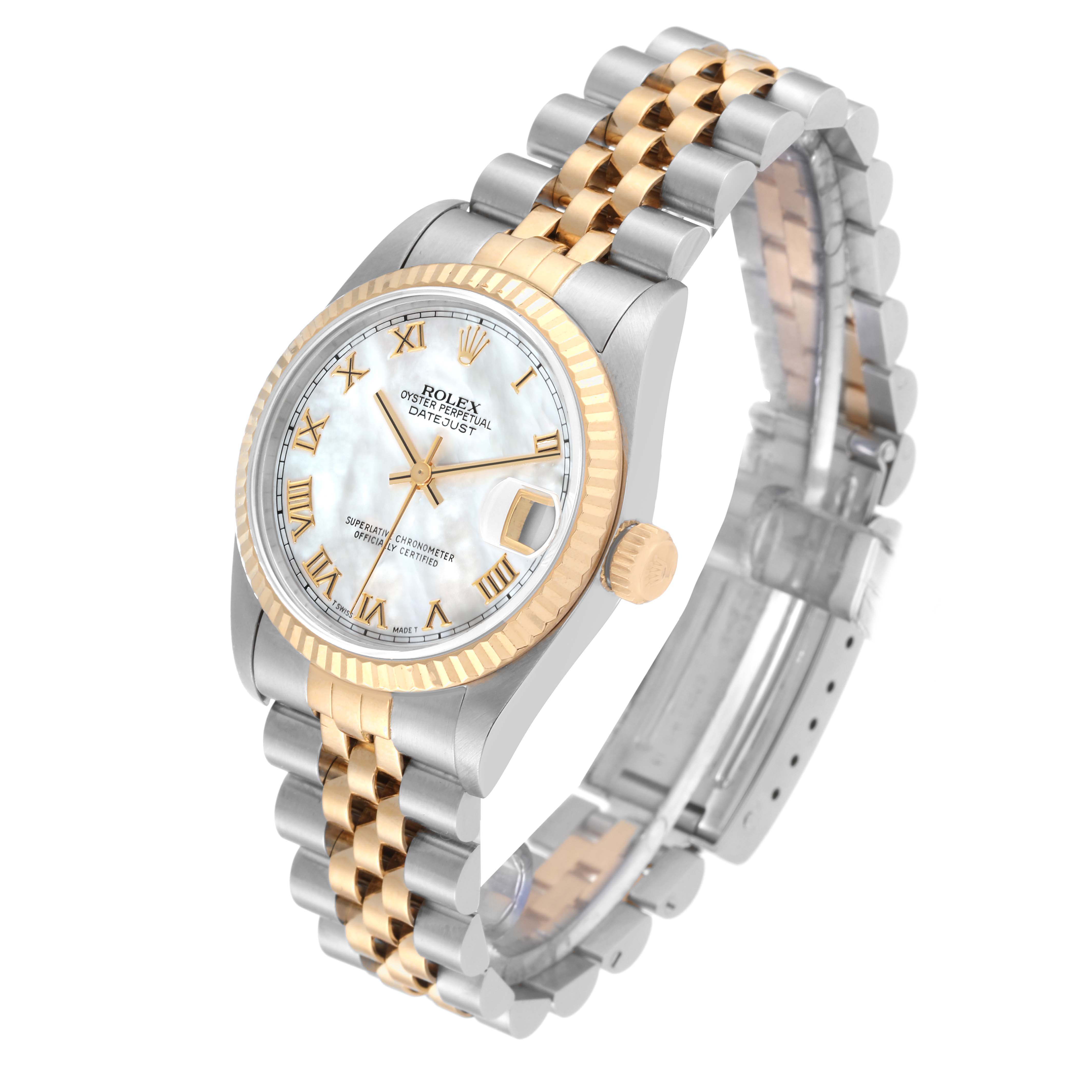 This image shows a Rolex Mid-Size 68273 Women
s Steel and Gold (two tone) Mother of Pearl Dial 68273 Women
s Steel and Gold (two tone) Mother of Pearl Dial Oyster Perpetual Datejust watch from a three-quarter angle, highlighting the bezel, crown, and two-tone bracelet.
