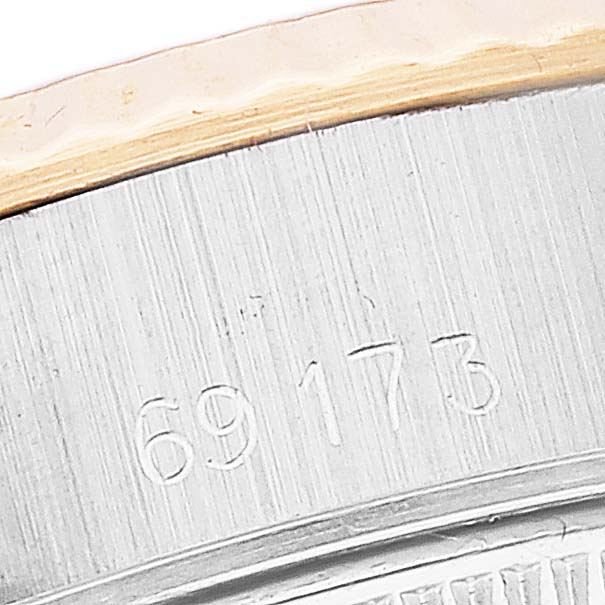 This close-up shows the reference number "69173" engraved on the case of a Rolex Datejust 69173 Women's Steel and Gold (two tone) Silver Dial 69173 Women's Steel and Gold (two tone) Silver Dial watch.