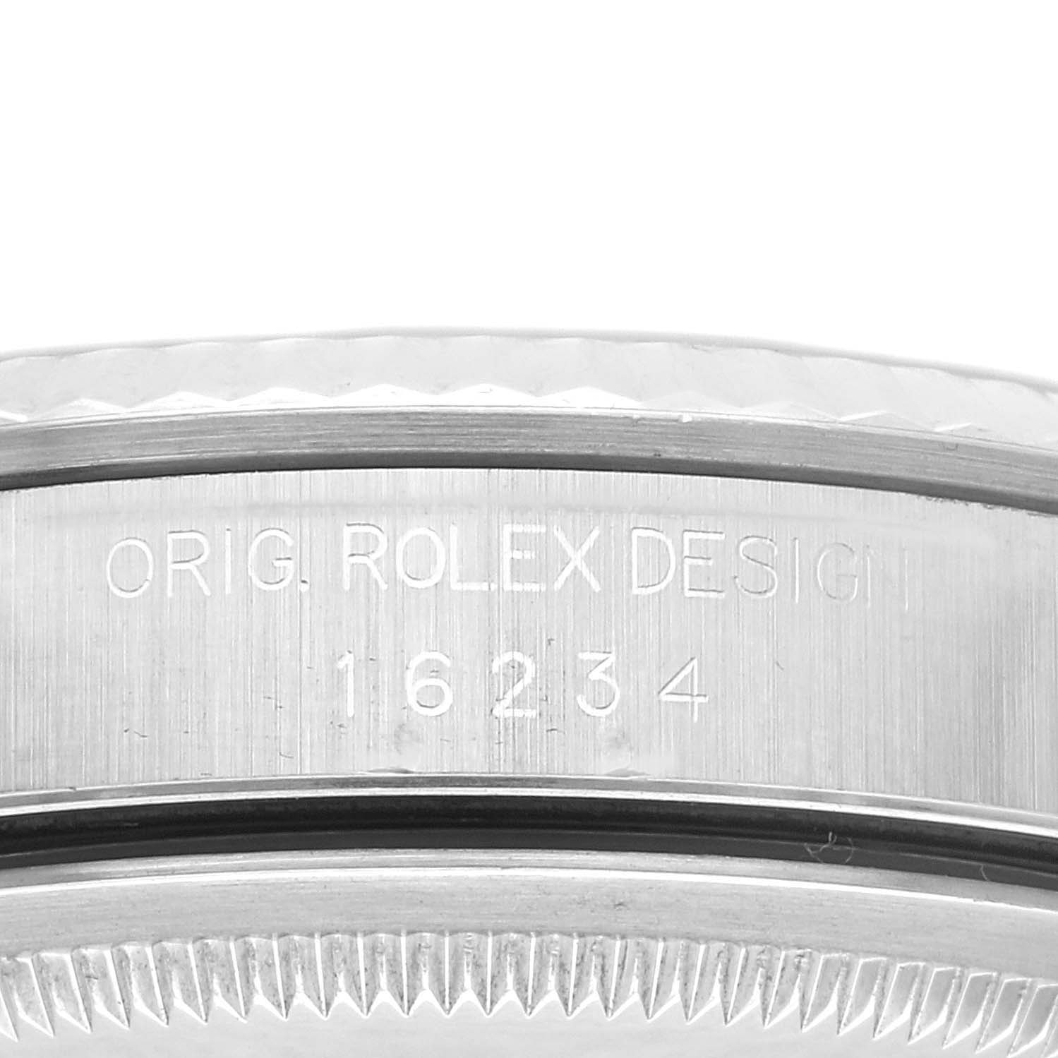 This image shows a close-up of the case side engraving on a Rolex Datejust 16234 Men's Stainless Steel Black Dial 16234 Men's Stainless Steel Black Dial watch.