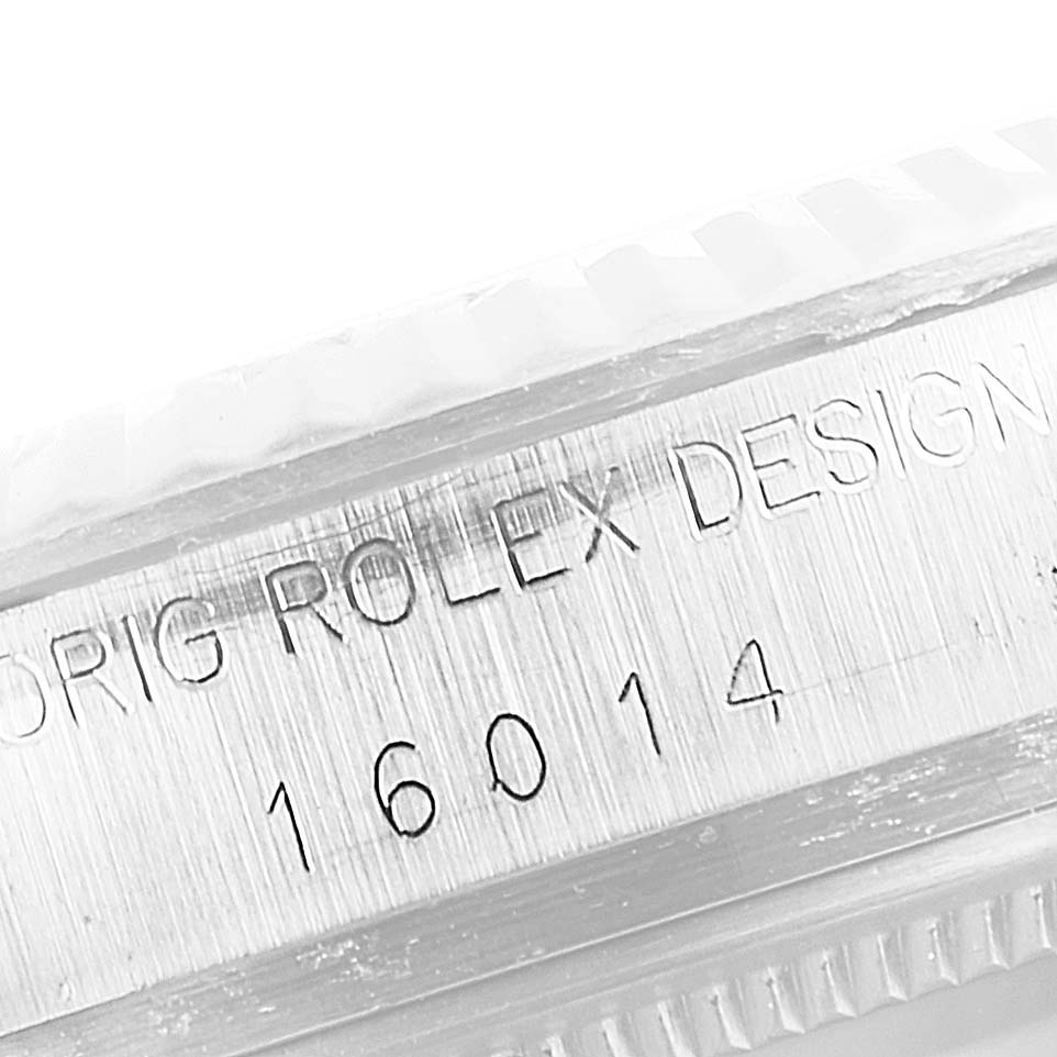 The image shows a close-up of the engraved model number "16014" on the case of a Rolex Vintage Collection 16014 Men's Stainless Steel Silver Dial 16014 Men's Stainless Steel Silver Dial watch.