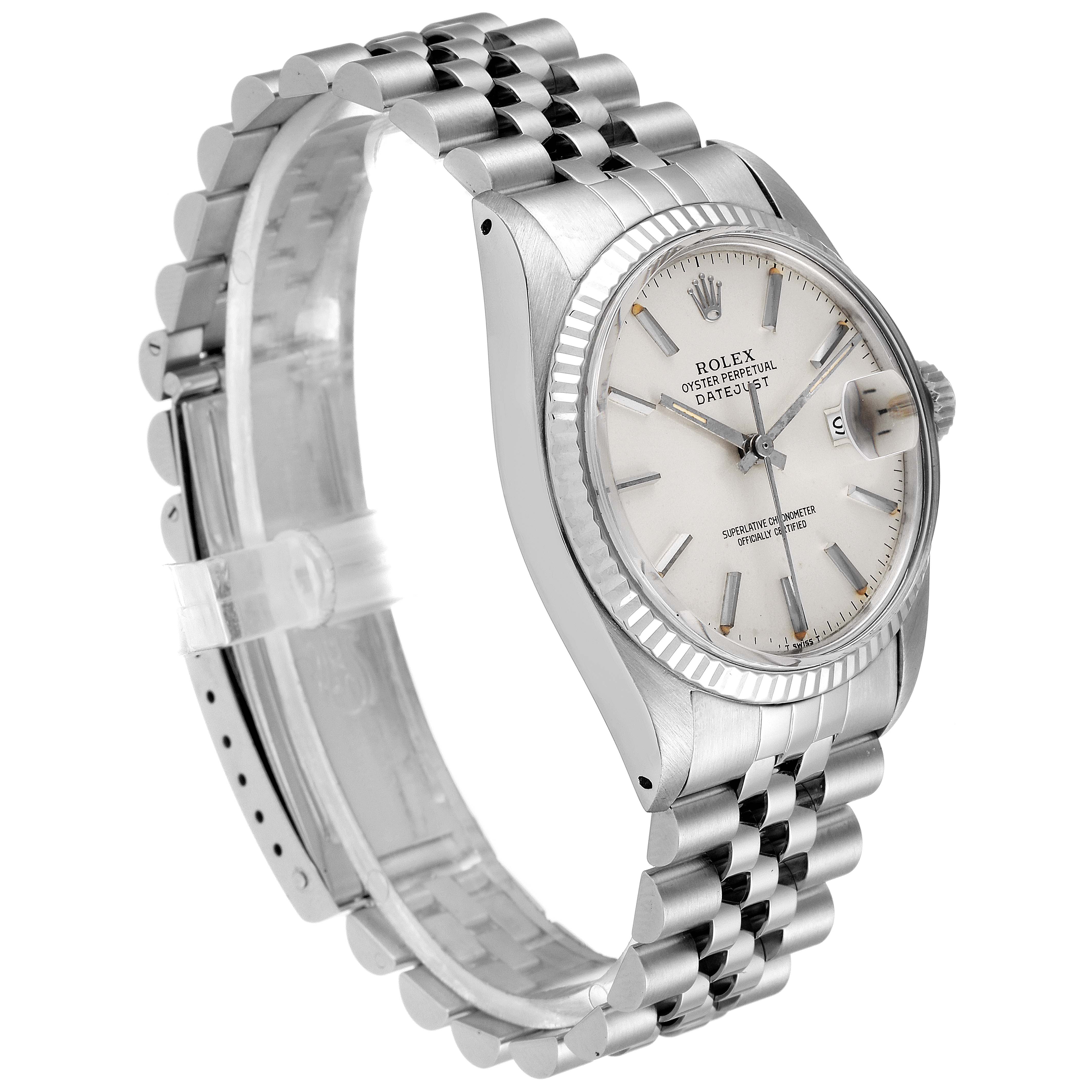 The image shows a side view of the Rolex Vintage Collection 16014 Men's Stainless Steel Silver Dial 16014 Men's Stainless Steel Silver Dial watch, highlighting the face, bezel, and bracelet.