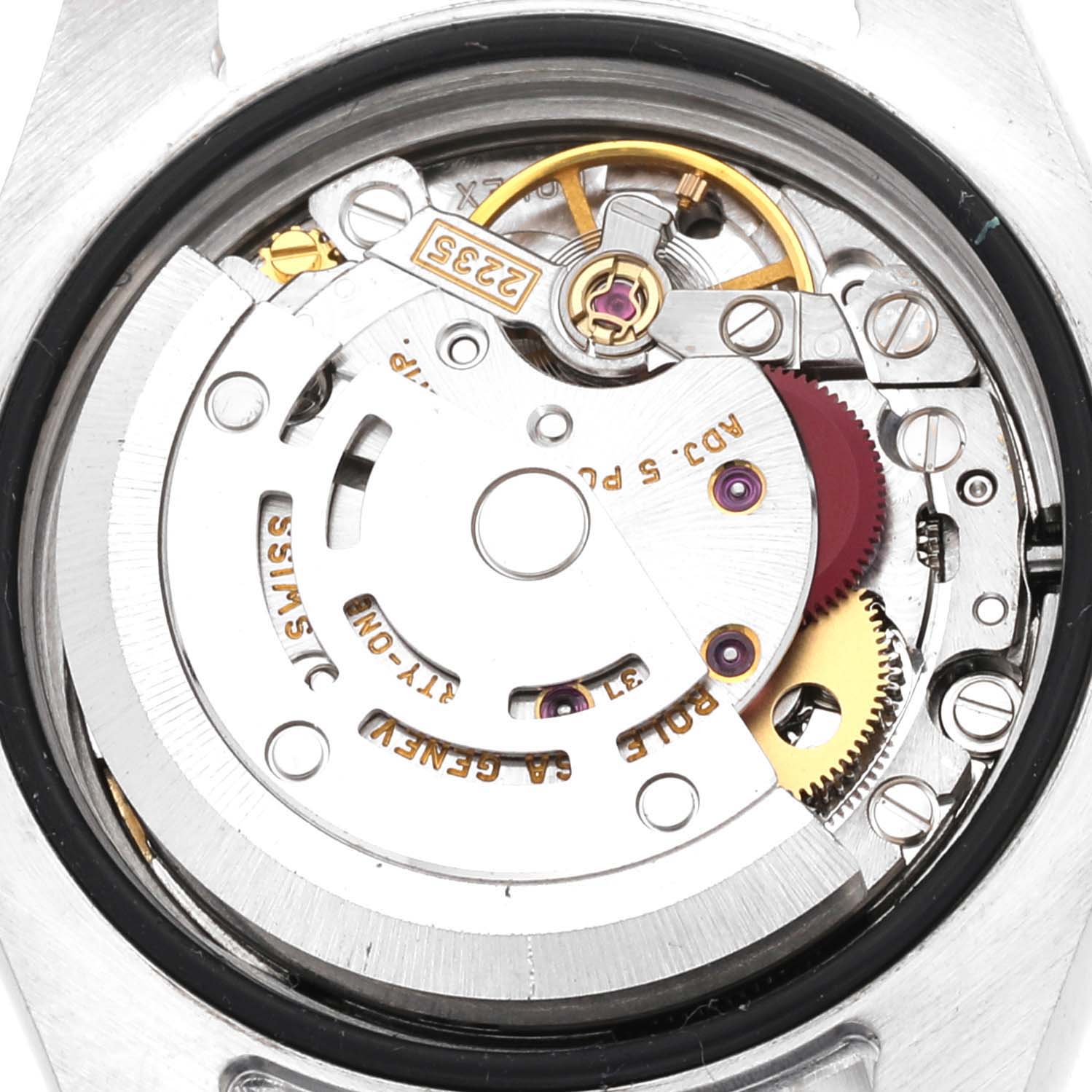 This image shows the internal mechanical movement of a Rolex Datejust 179173 Women's Steel and Gold (two tone) Champagne Dial 179173 Women's Steel and Gold (two tone) Champagne Dial watch from a close-up angle.