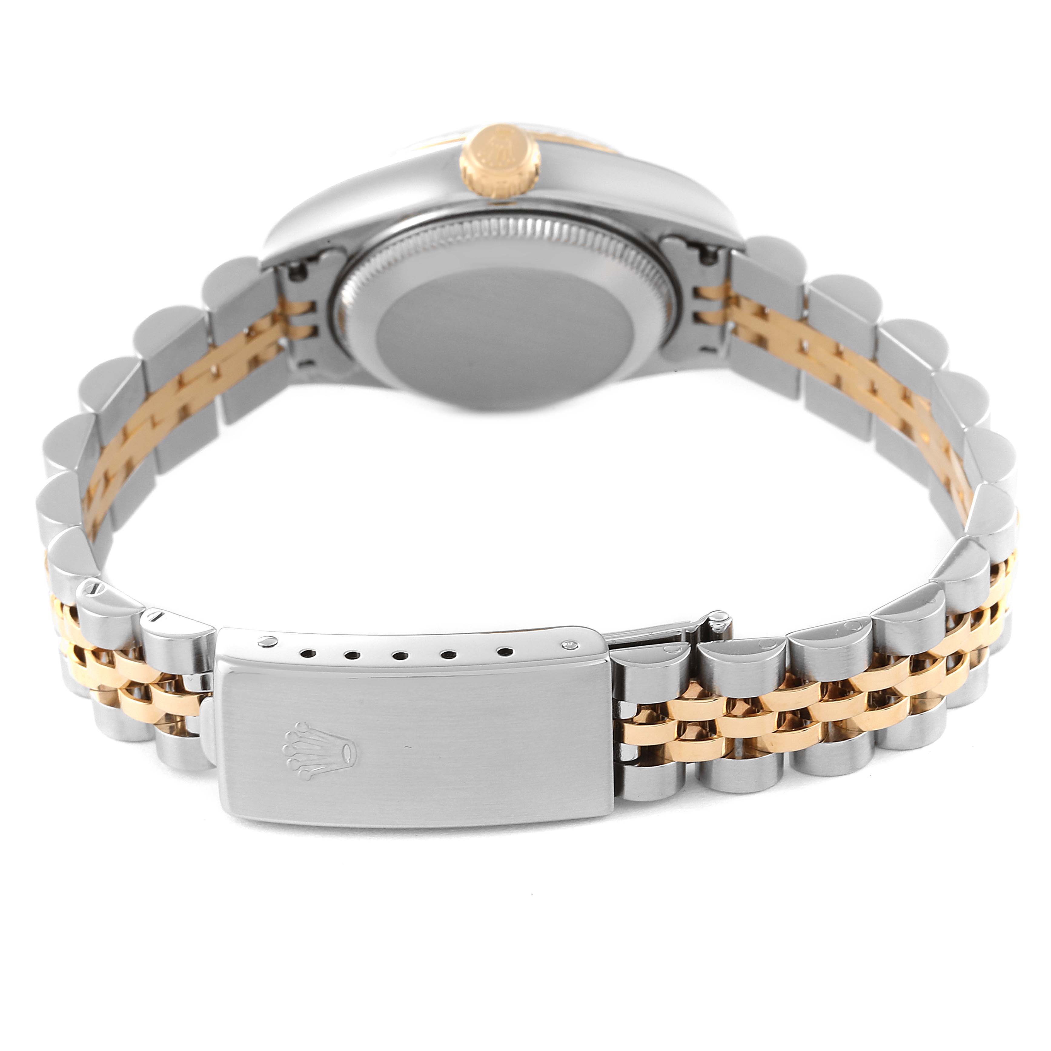The image shows a rear view of a Rolex Datejust 79173 Women's Steel and Gold (two tone) Beige Dial 79173 Women's Steel and Gold (two tone) Beige Dial watch, highlighting the case back, crown, and two-tone bracelet with the clasp.