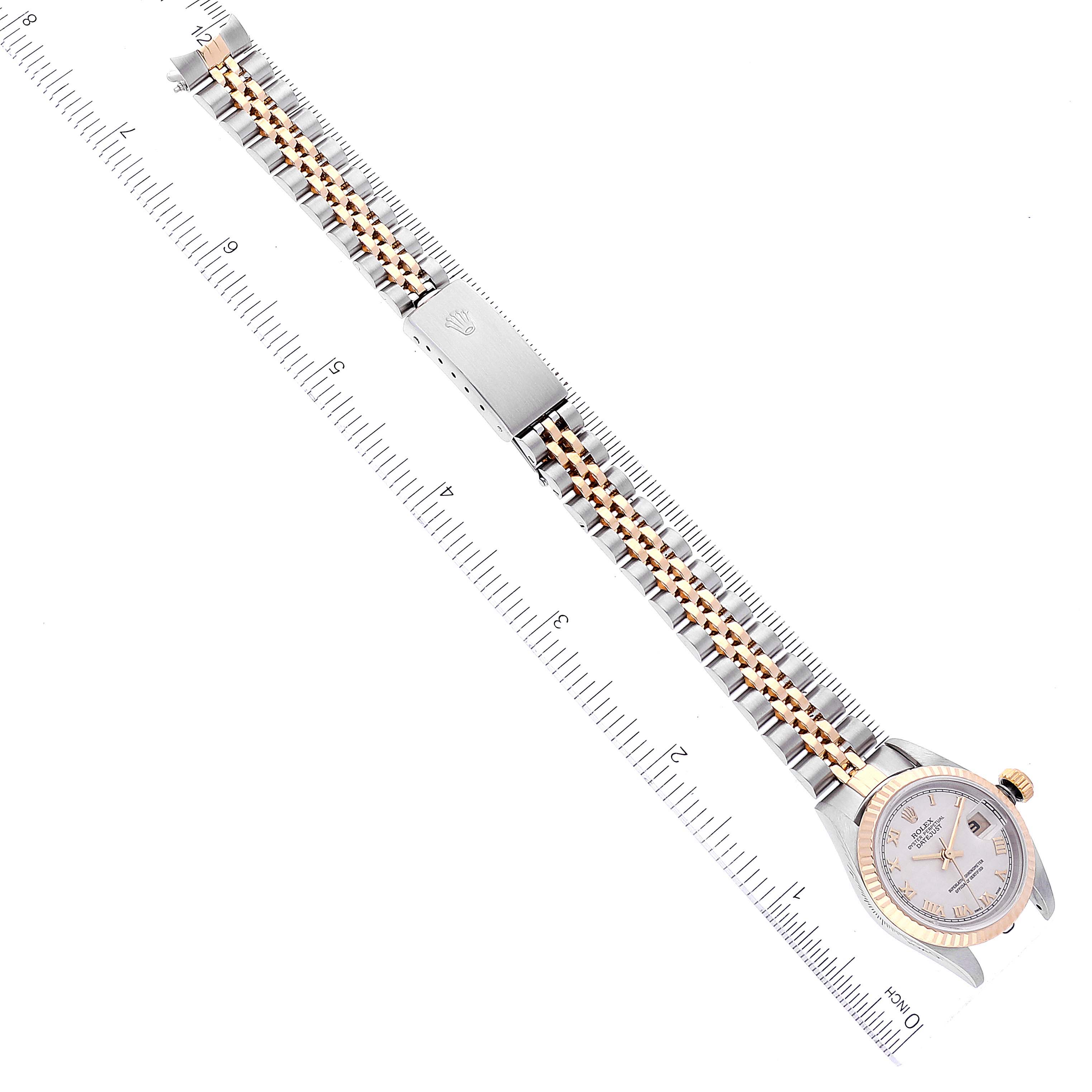 The image shows a Rolex Datejust 79173 Women's Steel and Gold (two tone) Beige Dial 79173 Women's Steel and Gold (two tone) Beige Dial watch positioned flat, displaying the face, bracelet, and clasp, measured against a ruler.