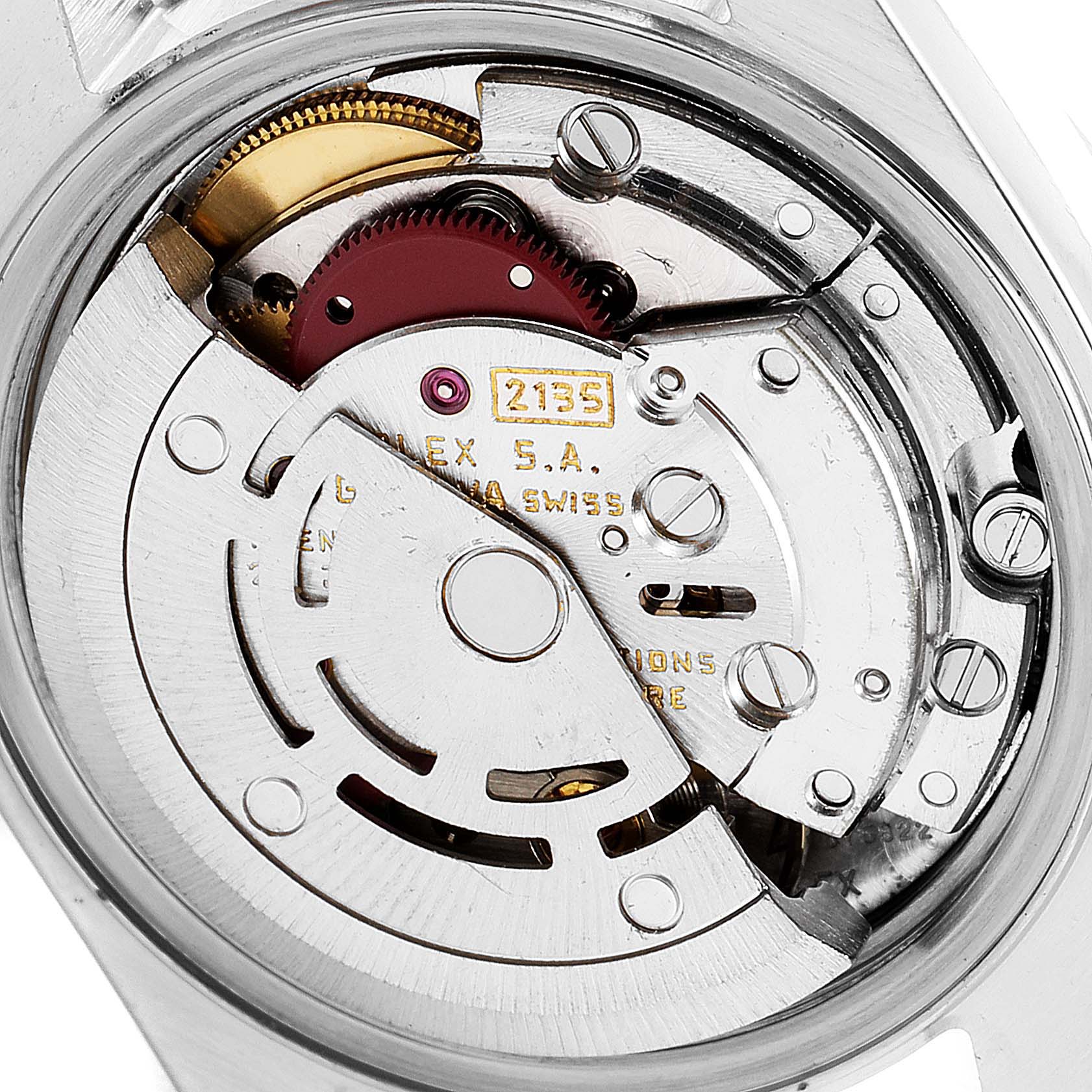 This image shows the intricate movement and inner workings of a Rolex Datejust 69163 Women's Steel and Gold (two tone) White Dial 69163 Women's Steel and Gold (two tone) White Dial watch, focusing on mechanical parts and gears.