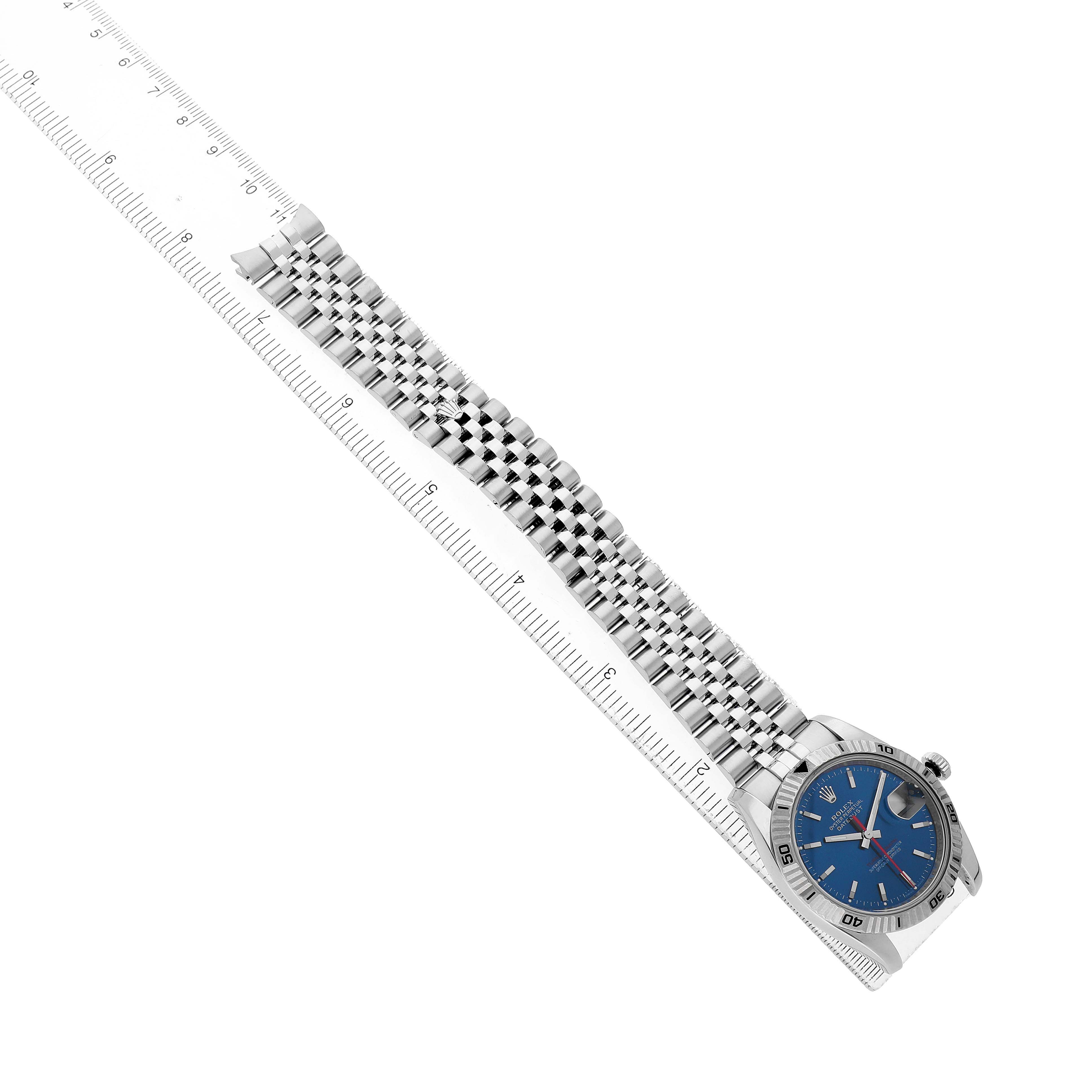 The Rolex Turn-o-Graph 116264 Men's Stainless Steel Blue Dial watch is shown diagonally from the front, highlighting its bezel, bracelet, and crown.