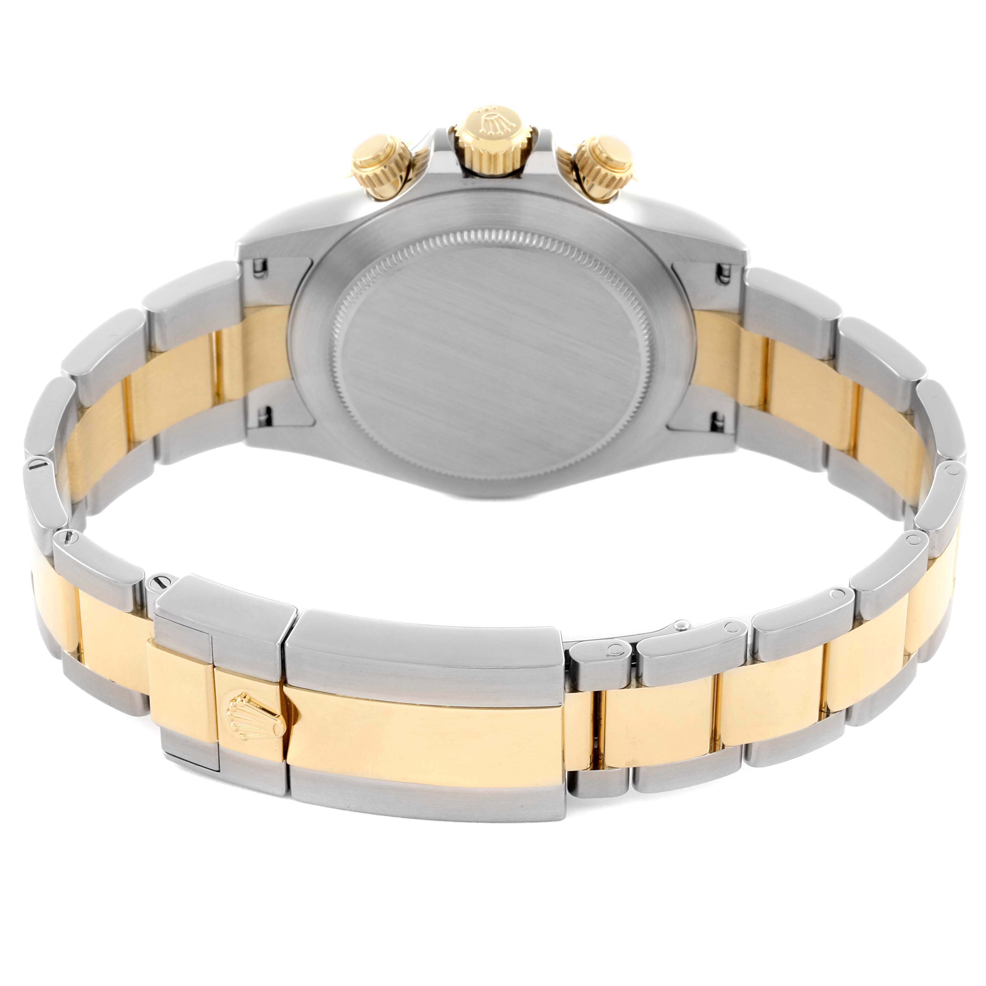 The Rolex Daytona 116503 Men's Steel and Gold (two tone) White Dial 116503 Men's Steel and Gold (two tone) White Dial watch is shown from the back, highlighting the case, crown, and two-tone bracelet.
