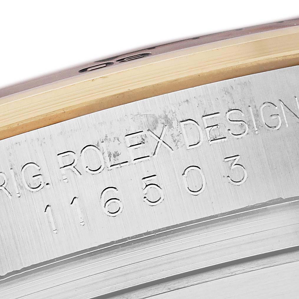 The image shows the side engraving on a Rolex Daytona 116503 Men's Steel and Gold (two tone) White Dial 116503 Men's Steel and Gold (two tone) White Dial watch case.