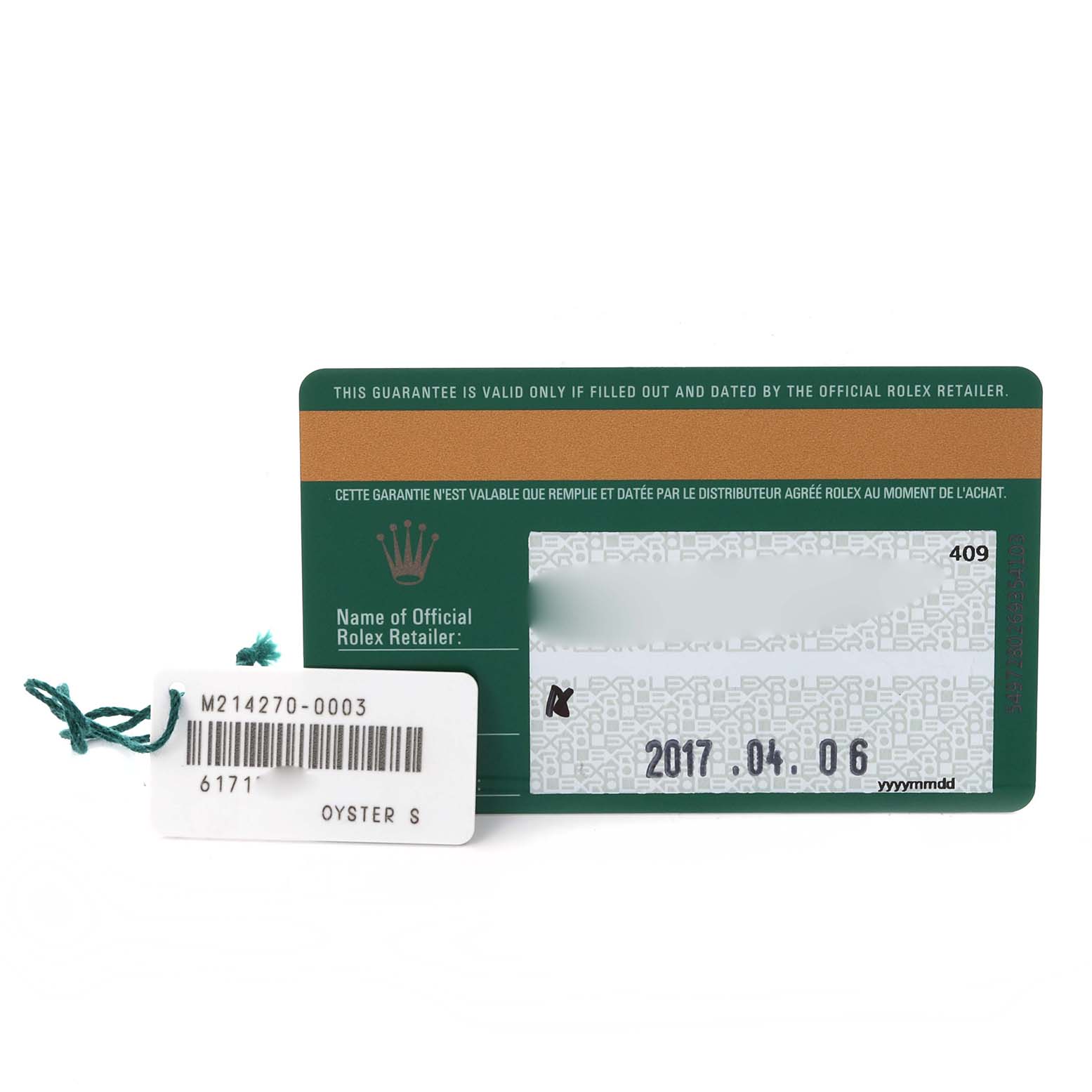 The image shows a Rolex Explorer 214270 Men
s Stainless Steel Black Dial 214270 Men
s Stainless Steel Black Dial warranty card and tag from a top-down angle.