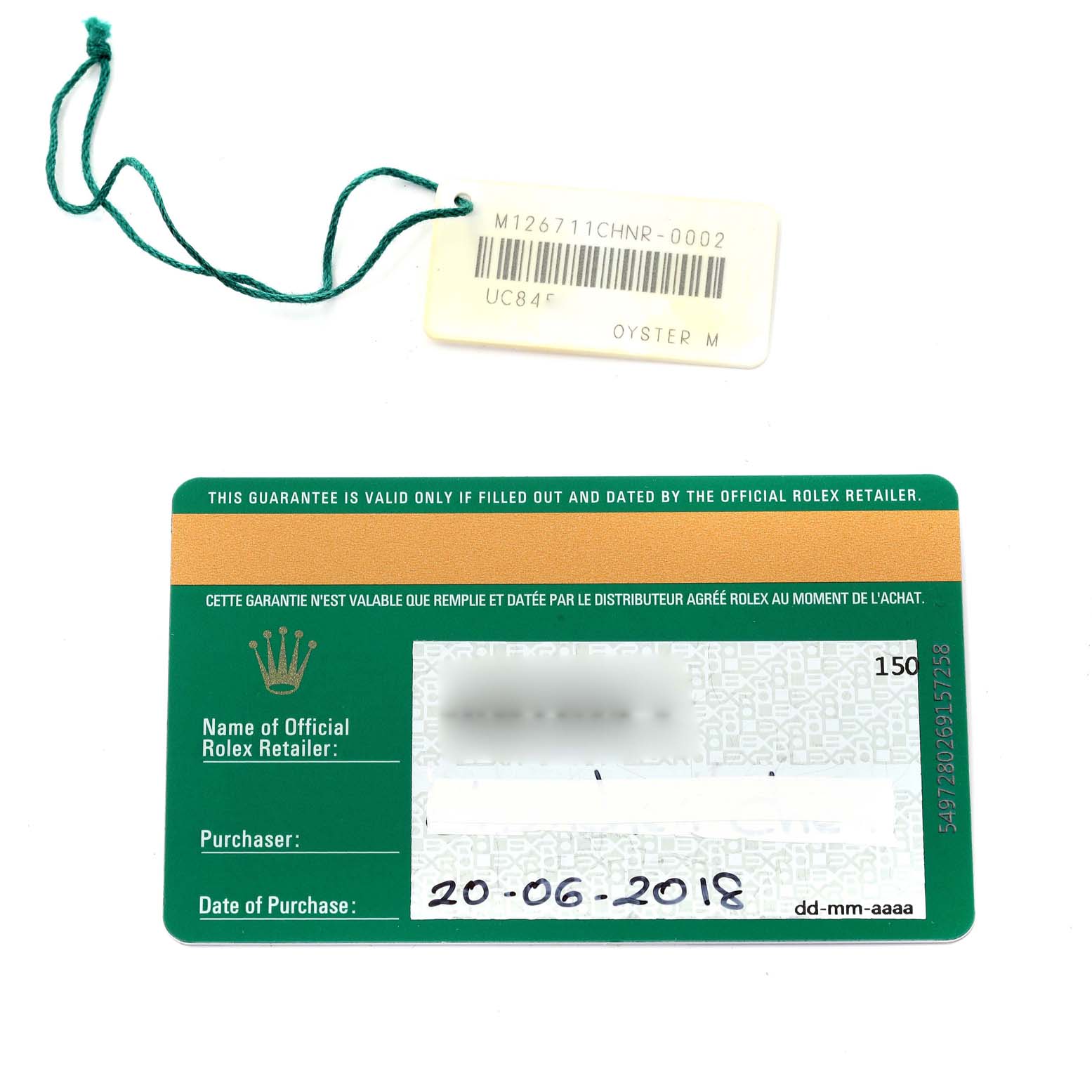 The image shows the warranty card and hang tag for a Rolex GMT-Master 126711 Men's Steel and Gold (two tone) Black Dial 126711 Men's Steel and Gold (two tone) Black Dial watch.