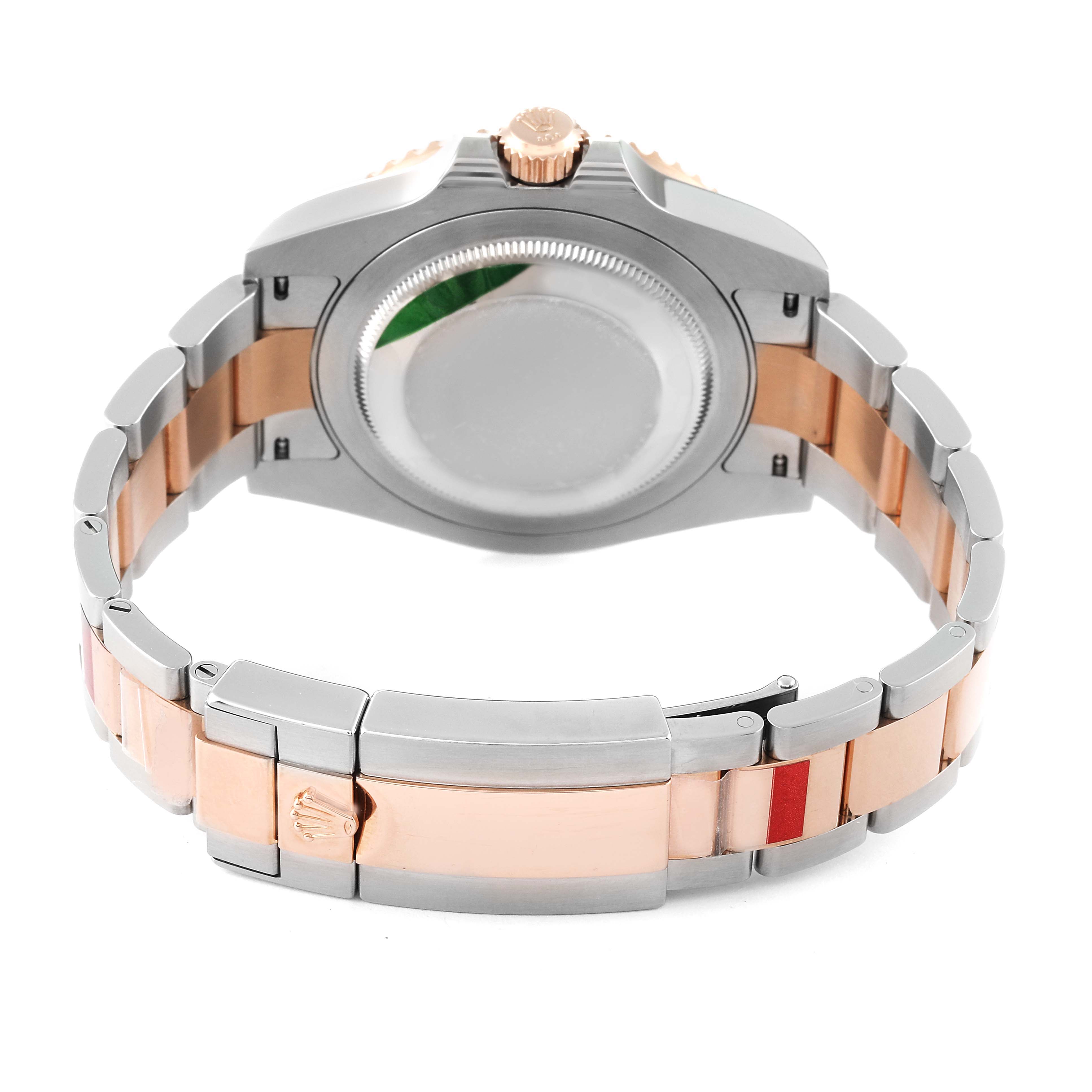 This image shows the back view of the case and bracelet of the Rolex GMT-Master 126711 Men's Steel and Gold (two tone) Black Dial 126711 Men's Steel and Gold (two tone) Black Dial watch.