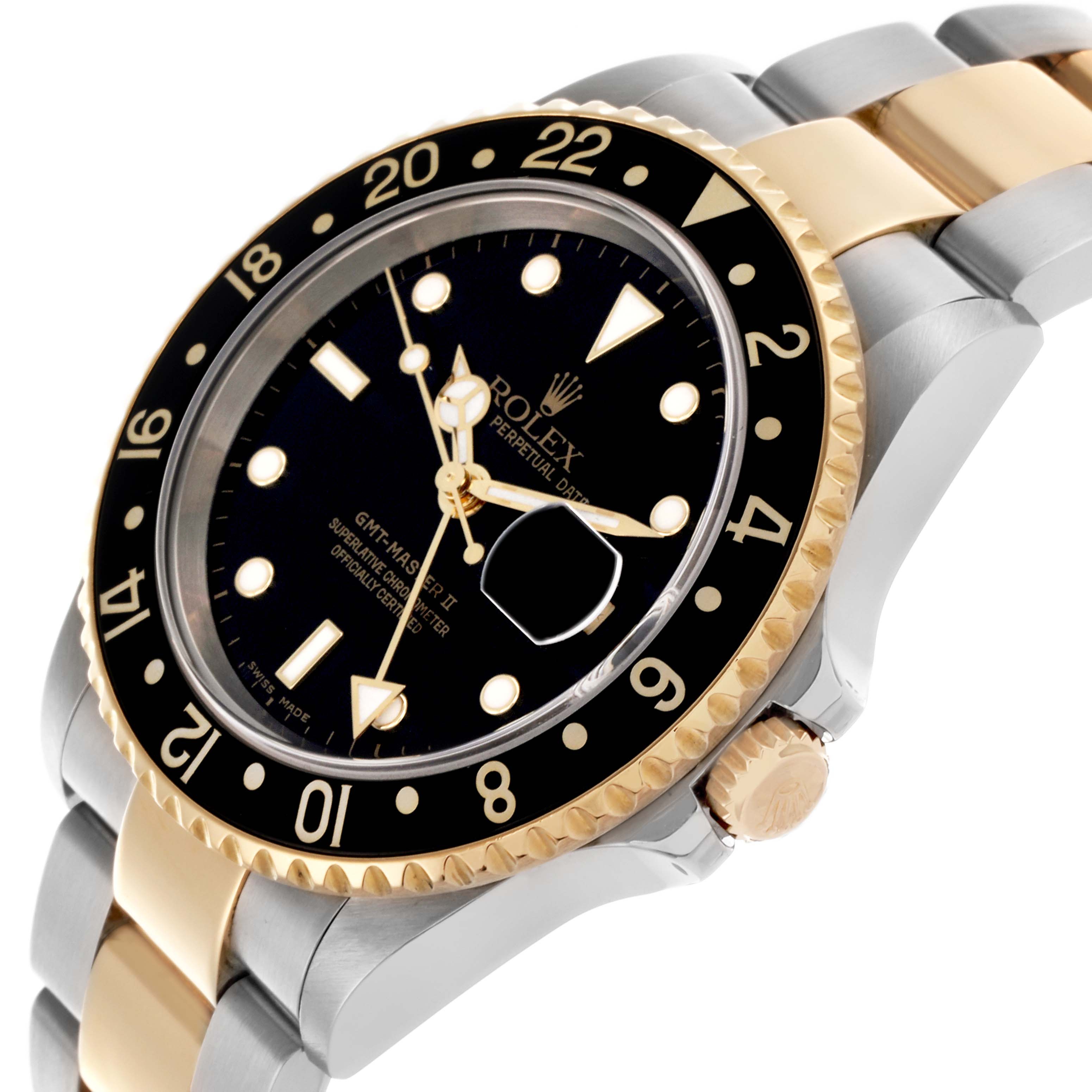 The Rolex GMT-Master 16713 Men
s Steel and Gold (two tone) Black Dial 16713 Men
s Steel and Gold (two tone) Black Dial watch is shown at an angled side view, highlighting its two-tone bezel, black dial, and gold accents on the bracelet.