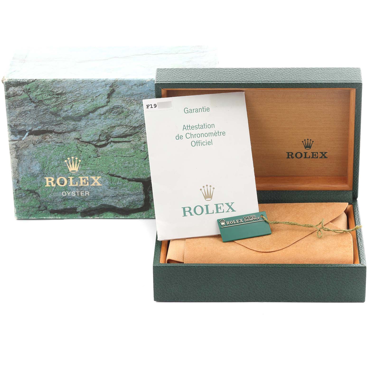 The image shows Rolex GMT-Master 16713 Men
s Steel and Gold (two tone) Black Dial 16713 Men
s Steel and Gold (two tone) Black Dial packaging, including the box, warranty card, and display pillow, viewed from a straightforward angle.