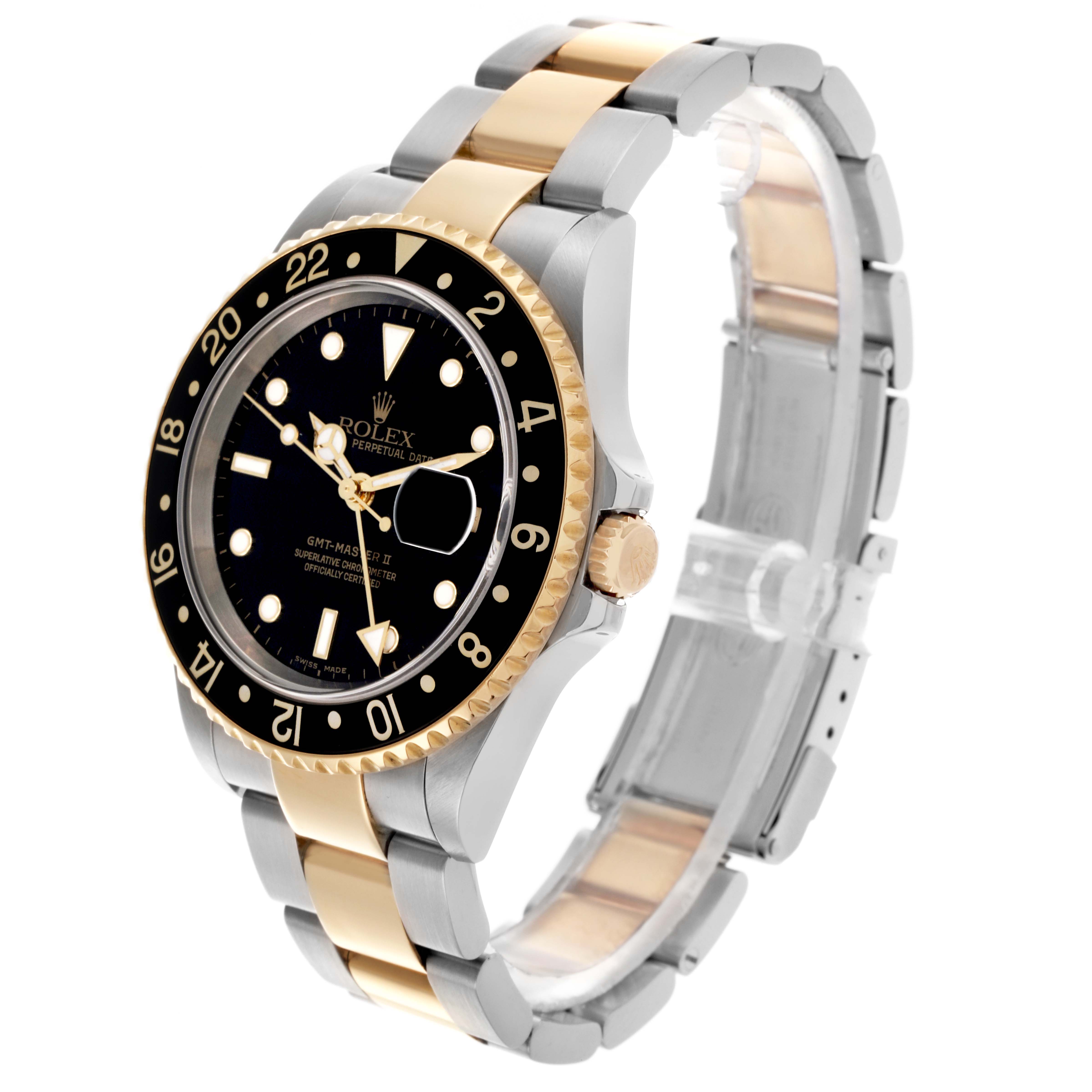 The Rolex GMT-Master 16713 Men
s Steel and Gold (two tone) Black Dial 16713 Men
s Steel and Gold (two tone) Black Dial watch is shown at an angle highlighting its bezel, face, and part of the band.