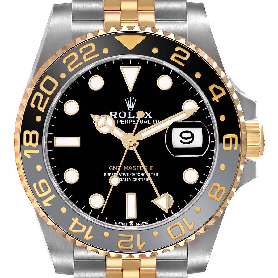 The Rolex GMT-Master II watch is shown from the front, highlighting the bezel, dial, hands, and part of the bracelet.