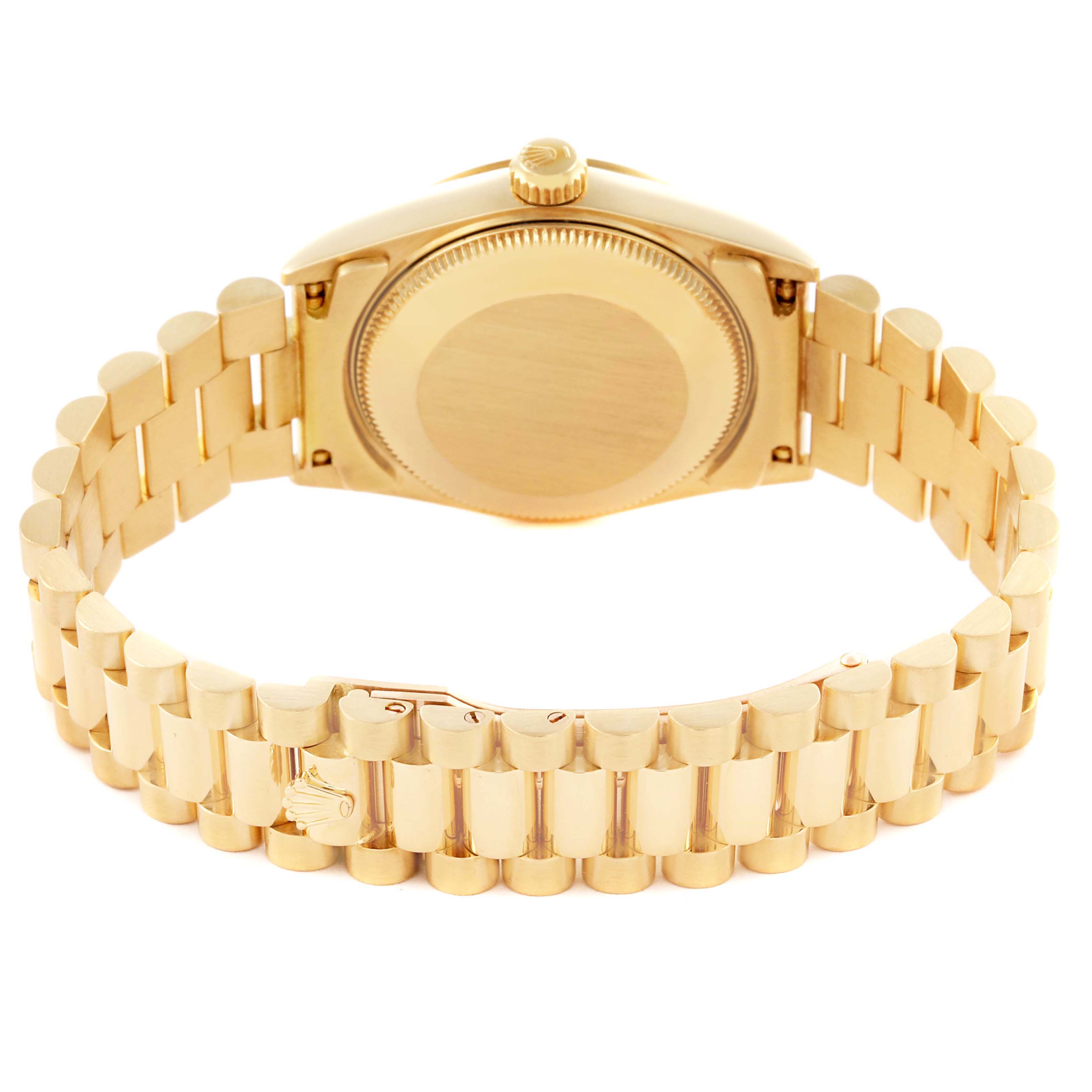 The image shows the back case and bracelet of a Rolex President 68278 Women's Yellow Gold White Dial 68278 Women's Yellow Gold White Dial watch, highlighting its clasp and links.