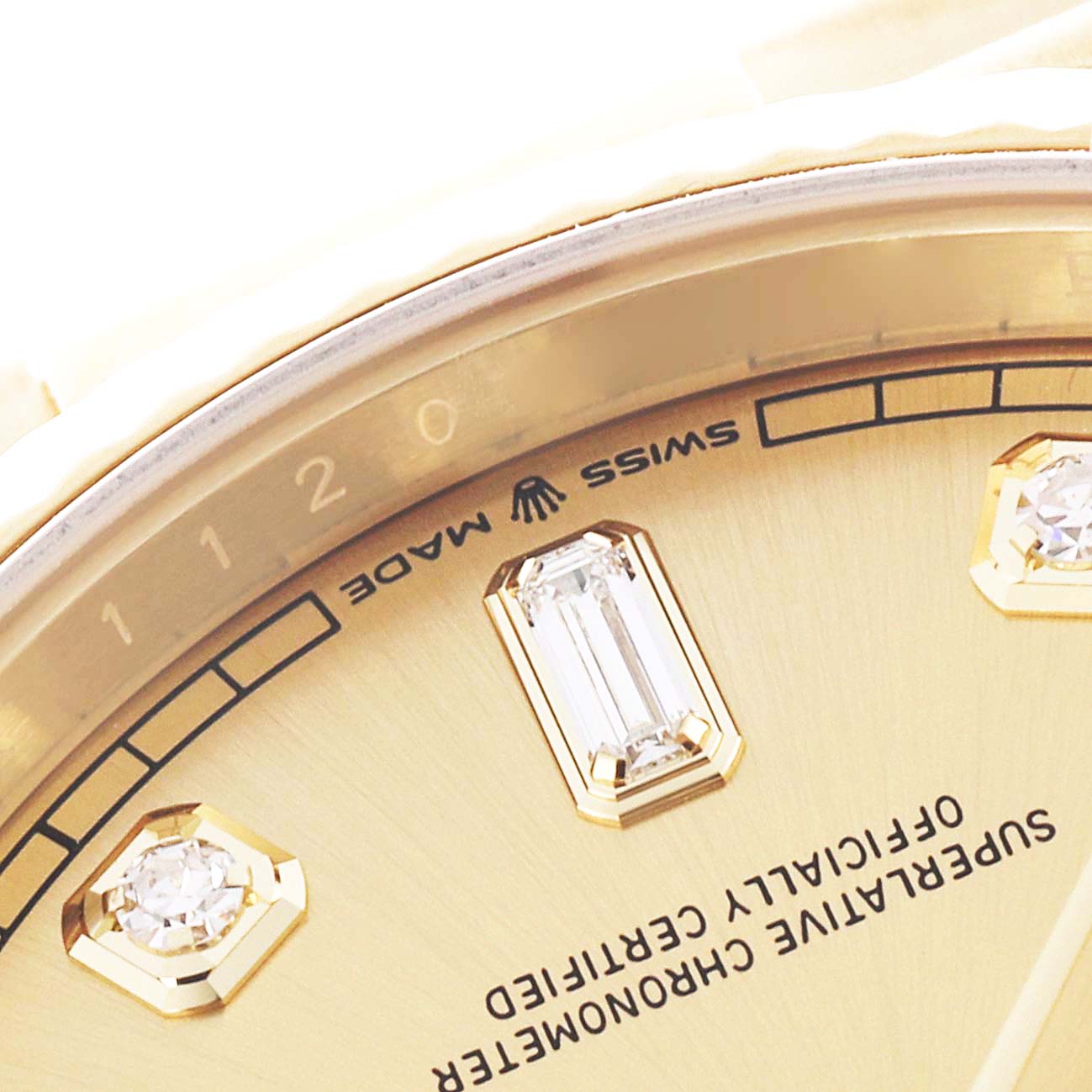 The image shows a close-up of the Rolex President 128238 Men's Yellow Gold Champagne Dial 128238 Men's Yellow Gold Champagne Dial watch dial, highlighting the diamond markers and "Swiss Made" text.