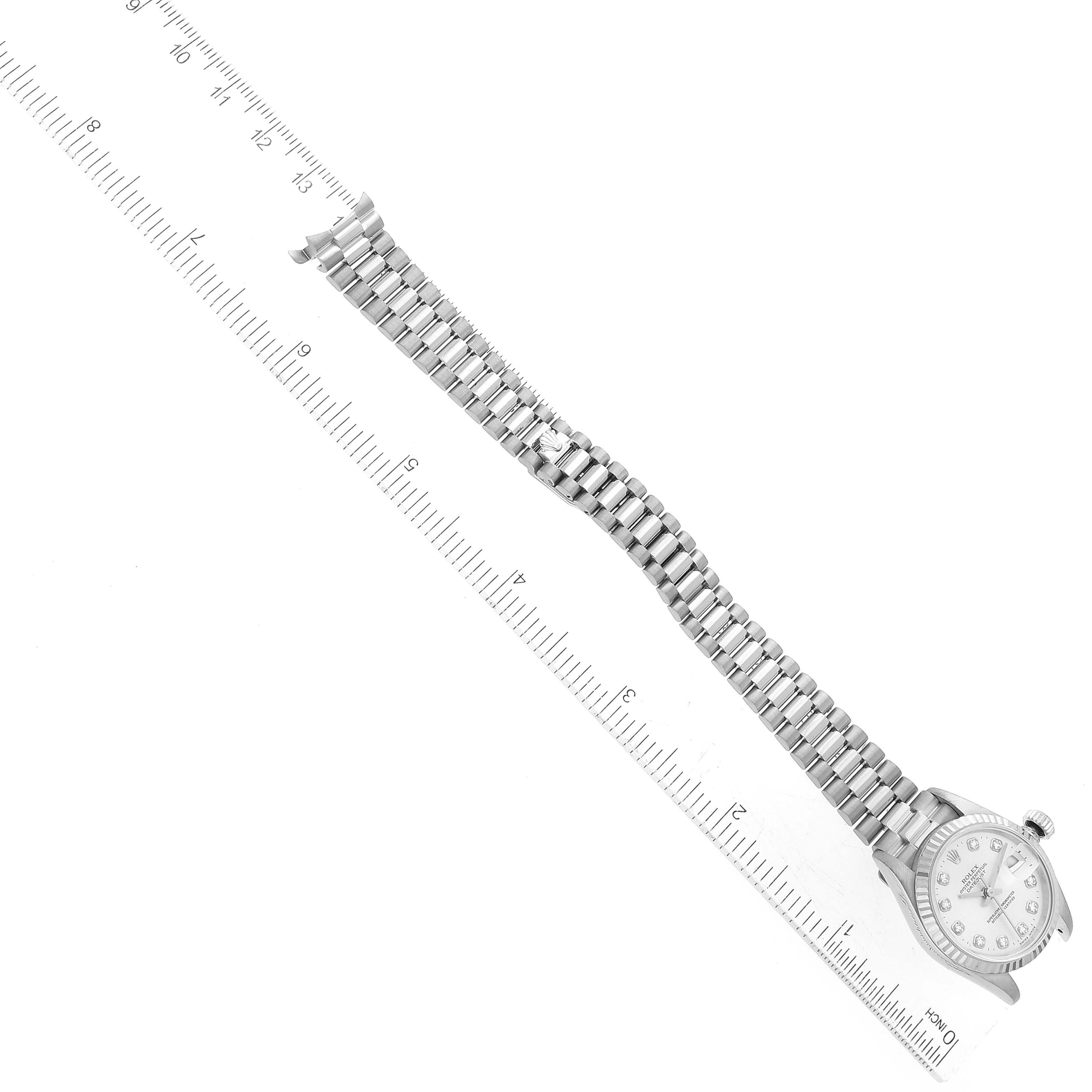 The image shows a top-down view of a Rolex President 79179 Women's White Gold Silver Dial 79179 Women's White Gold Silver Dial model watch, displaying the face and the length of the bracelet.