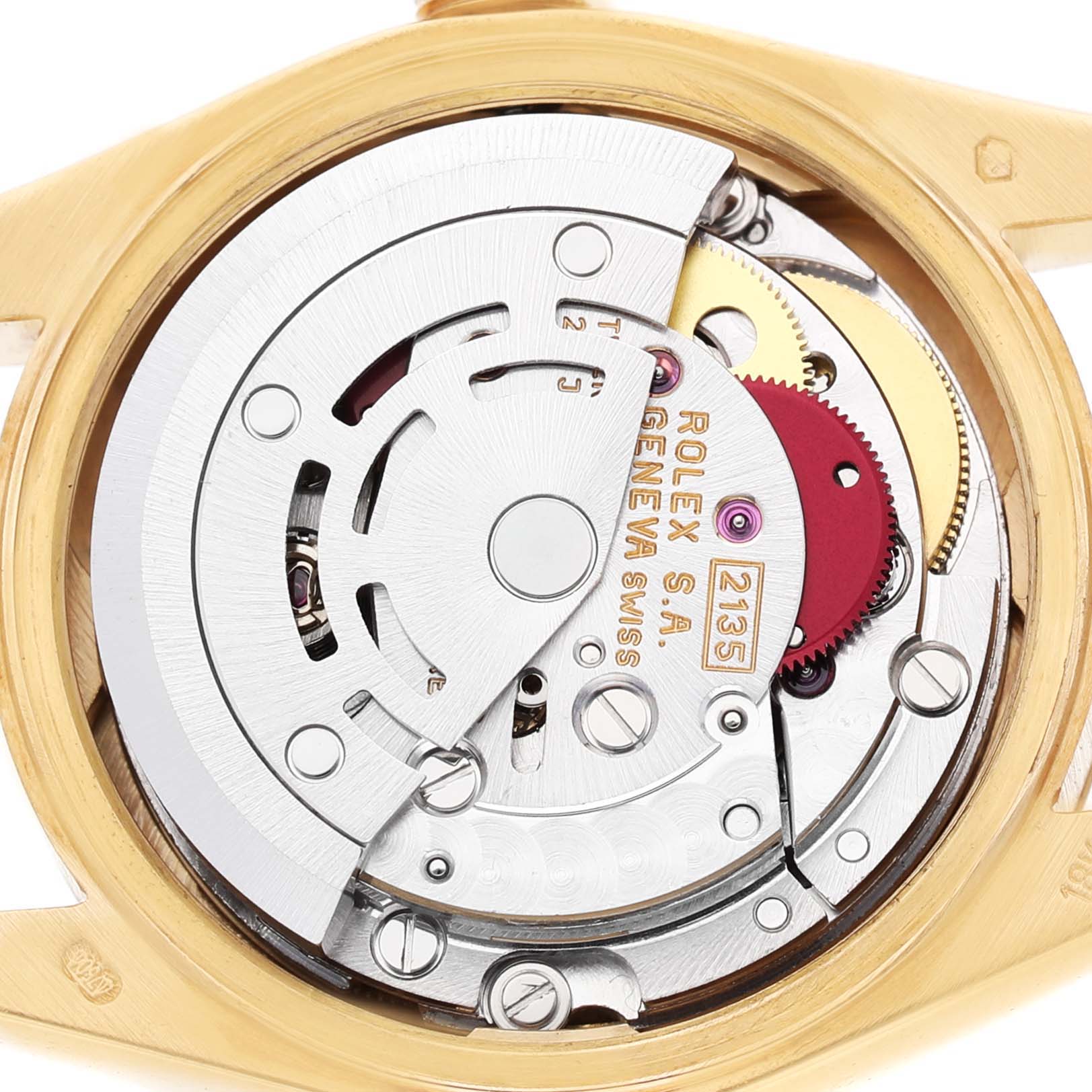 The image shows the movement mechanism of a Rolex President 69178 Women's Yellow Gold Champagne Dial watch, focusing on the intricate internal components.