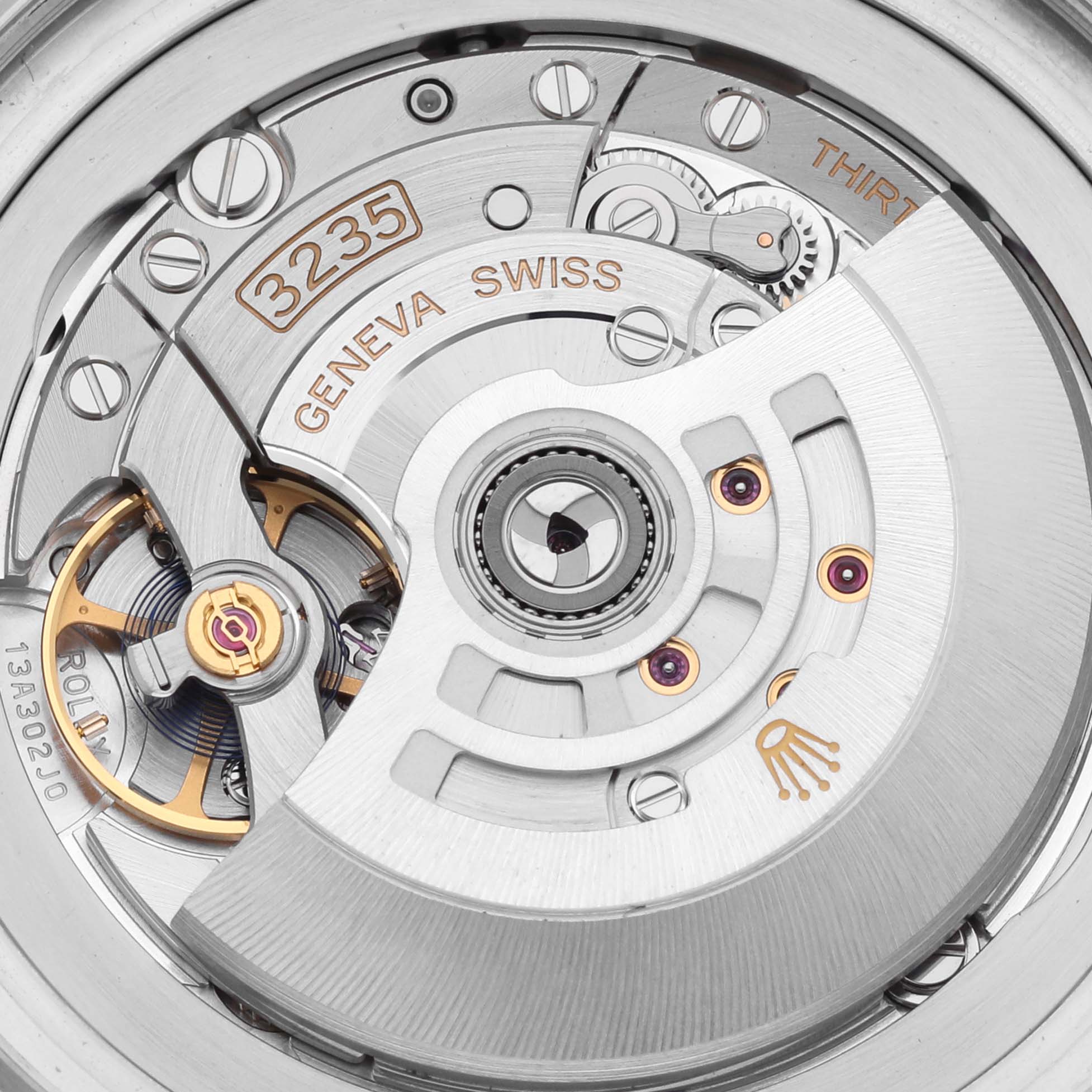 The image shows a detailed view of the Rolex Sea-Dweller 126660 Men
s Stainless Steel Blue Dial 126660 Men
s Stainless Steel Blue Dial
s movement, focusing on the rotor and intricate mechanical components.