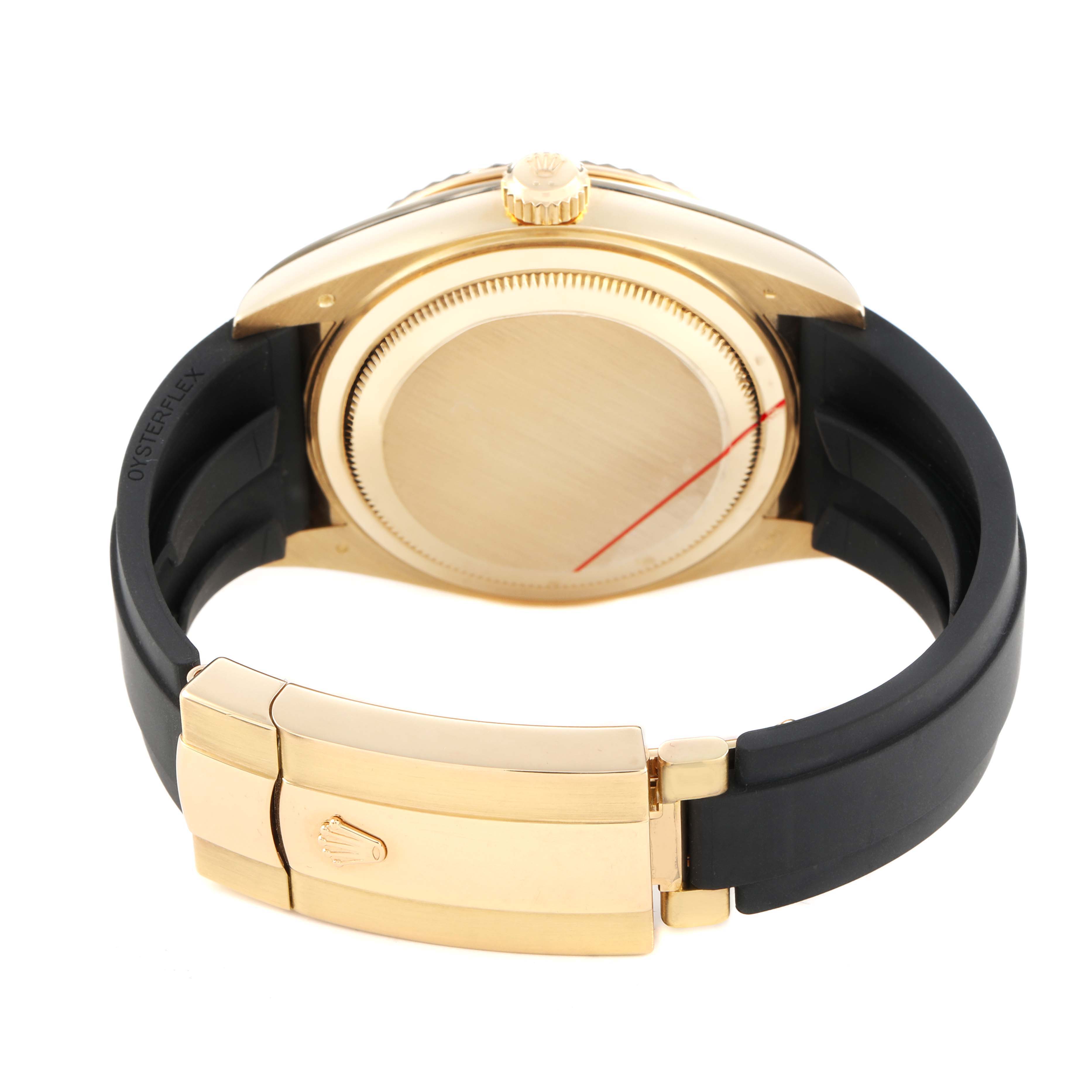 The image shows the back of a Rolex Sky-Dweller 336238 Men's Yellow Gold White Dial watch highlighting the gold case, crown, and clasp on the black strap.