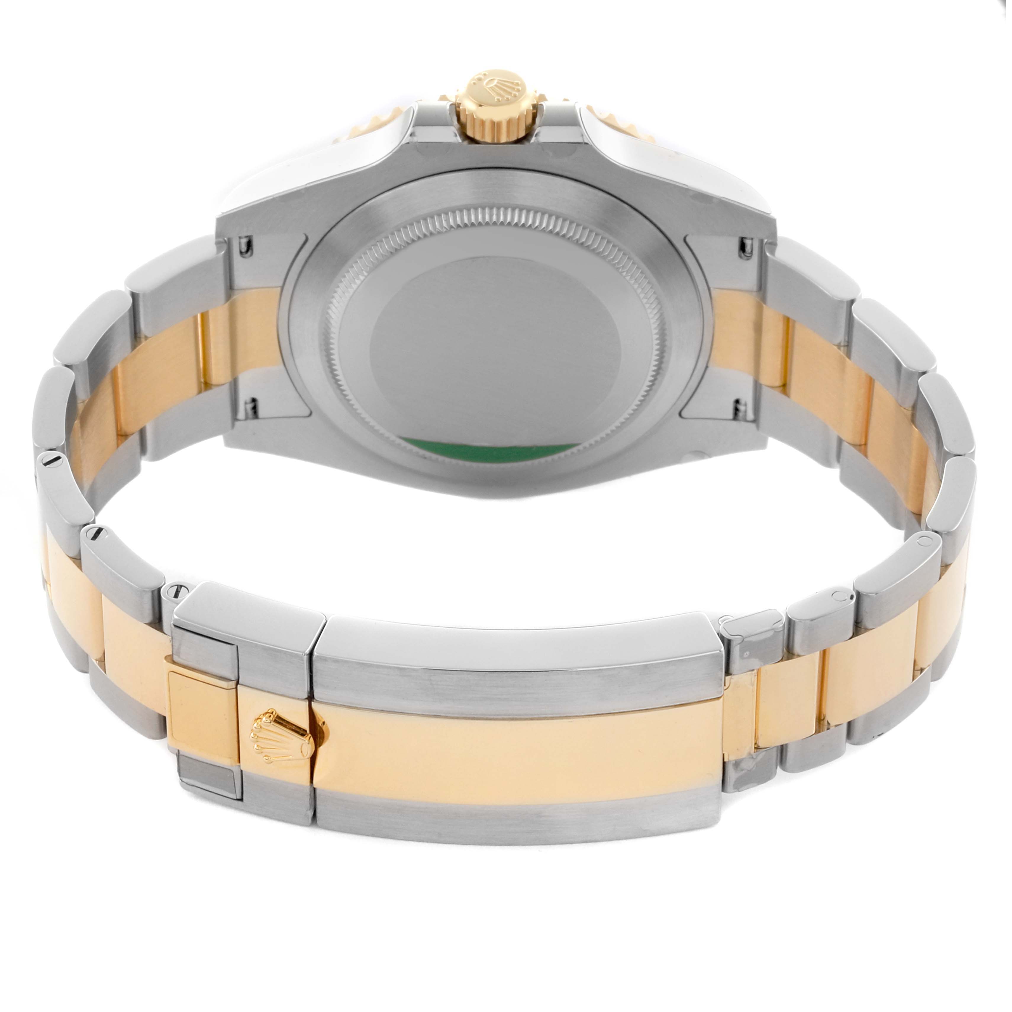 The image shows a Rolex Submariner 126613LB Men's Steel and Gold (two tone) Blue Dial 126613LB Men's Steel and Gold (two tone) Blue Dial from the back, highlighting the case back, bracelet, clasp, and crown.