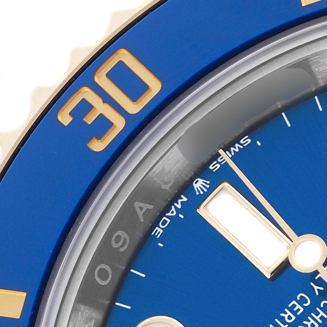 The image shows a close-up angle of a Rolex Submariner 126613LB Men's Steel and Gold (two tone) Blue Dial 126613LB Men's Steel and Gold (two tone) Blue Dial, highlighting the bezel, dial, and hour marker.