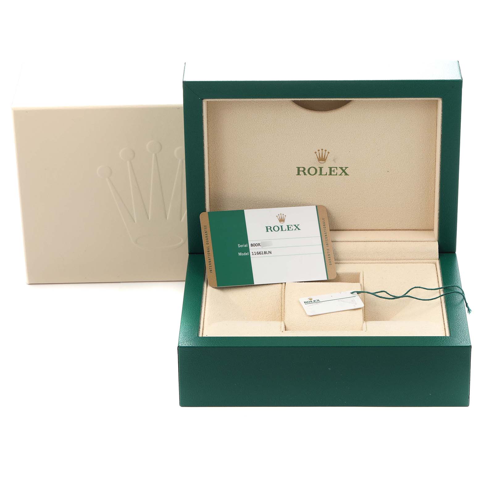 The image shows an open box of a Rolex Submariner 116618LN Men's Yellow Gold Black Dial 116618LN Men's Yellow Gold Black Dial with a card, tag, and extra insert, but the watch itself is not visible.