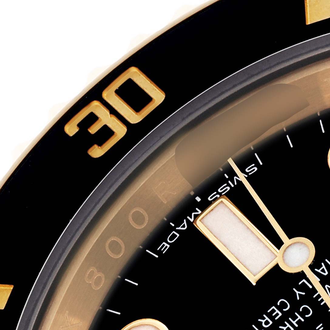 The image shows a close-up of the dial and bezel of a Rolex Submariner 116618LN Men's Yellow Gold Black Dial 116618LN Men's Yellow Gold Black Dial, highlighting the 30-minute mark.