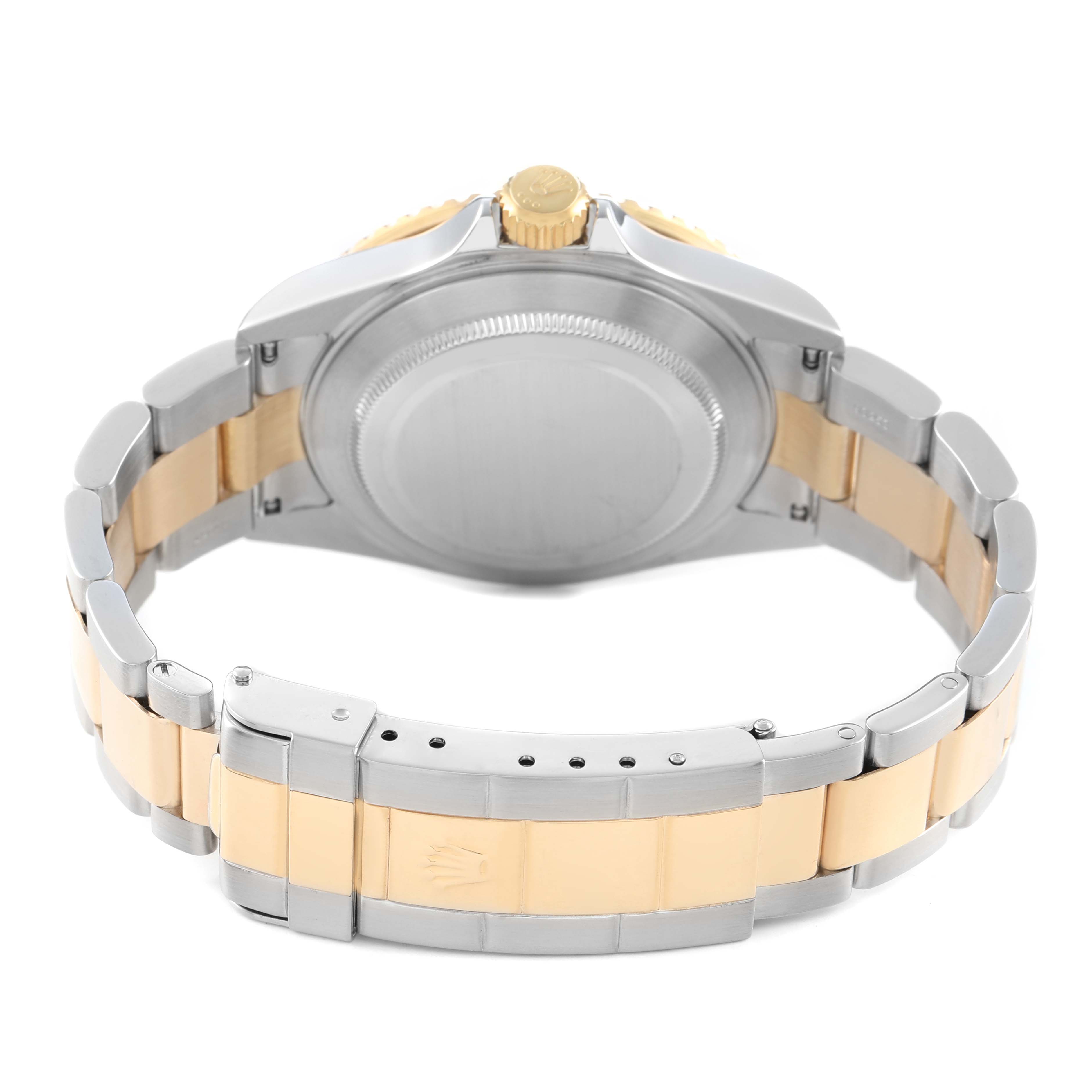 The image shows the back and bracelet of a Rolex Submariner 16613 Men's Steel and Gold (two tone) Blue Dial, highlighting its two-tone gold and silver links.