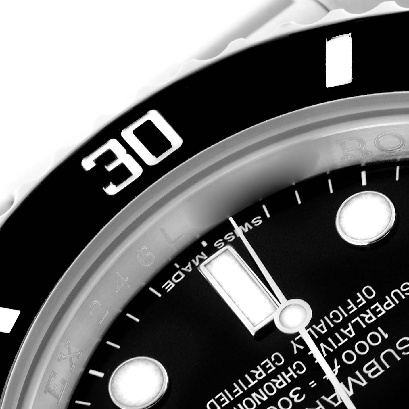 The image shows a close-up angle of the dial and bezel of a Rolex Submariner 116610LN Men's Stainless Steel Black Dial 116610LN Men's Stainless Steel Black Dial watch, highlighting the markings and indices.