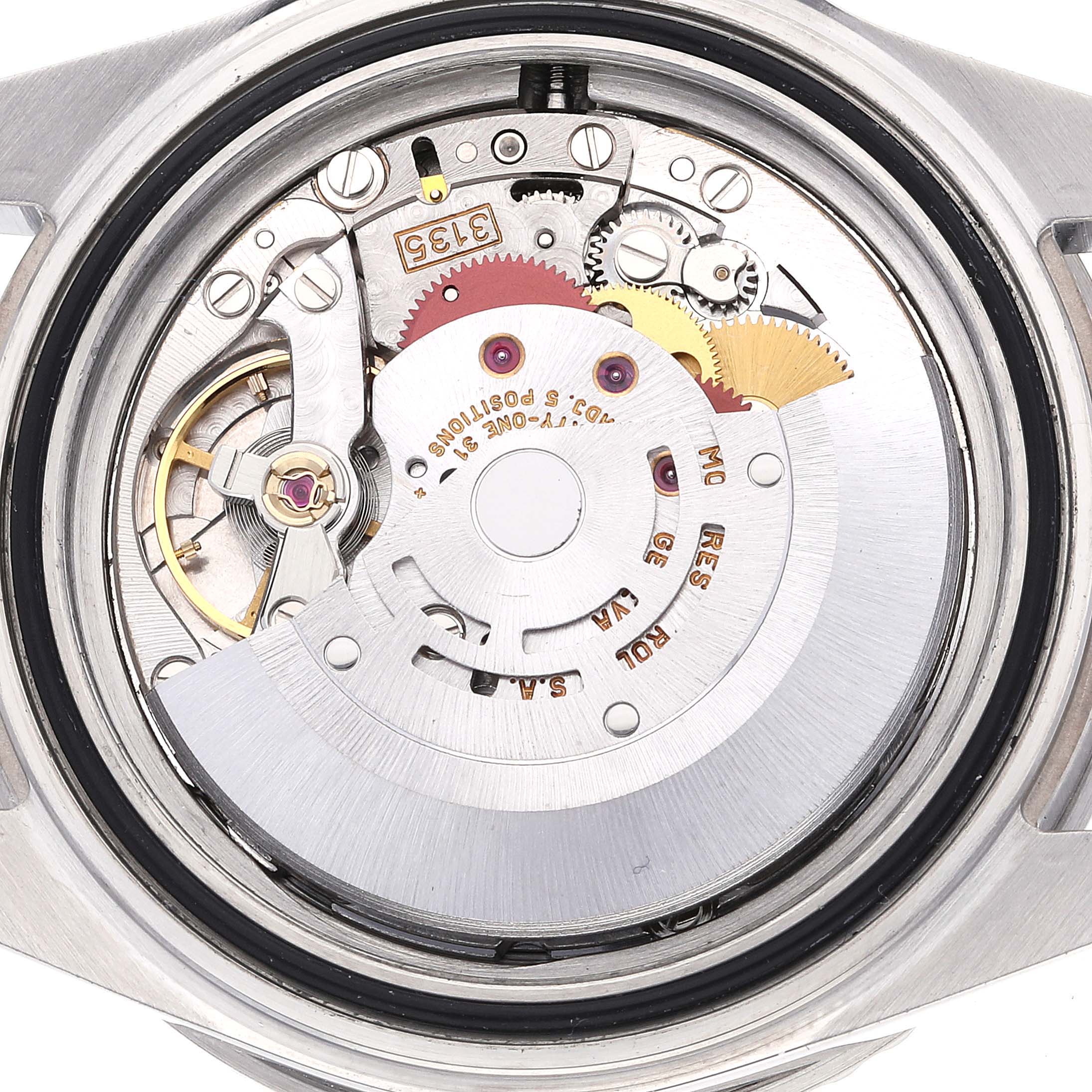 This is a close-up view of the movement inside a Rolex Submariner 16610 Men's Stainless Steel Black Dial 16610 Men's Stainless Steel Black Dial watch, showcasing its intricate mechanical components.