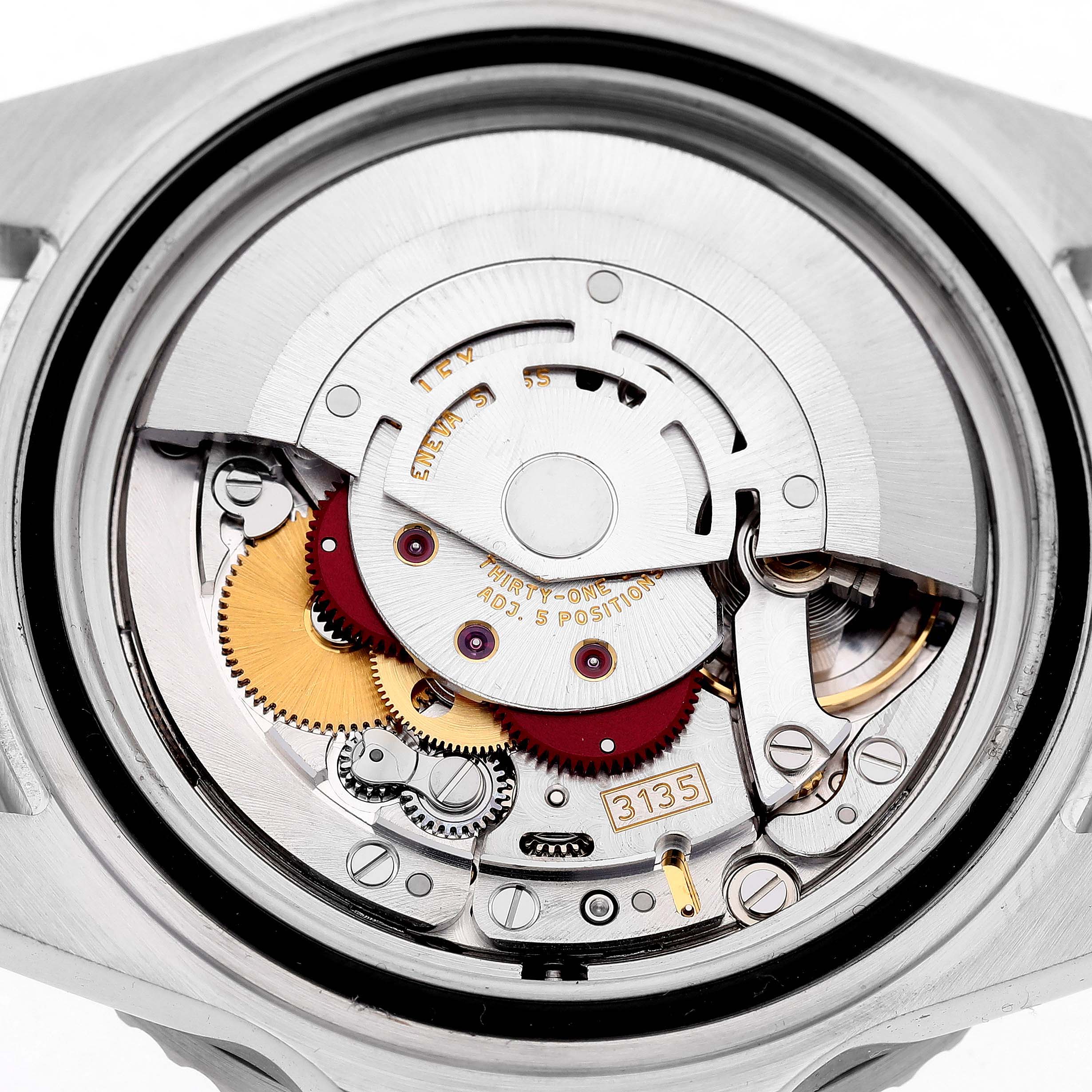 The image shows the movement and internal mechanism of a Rolex Submariner 16610 Men's Stainless Steel Black Dial watch from a back view.