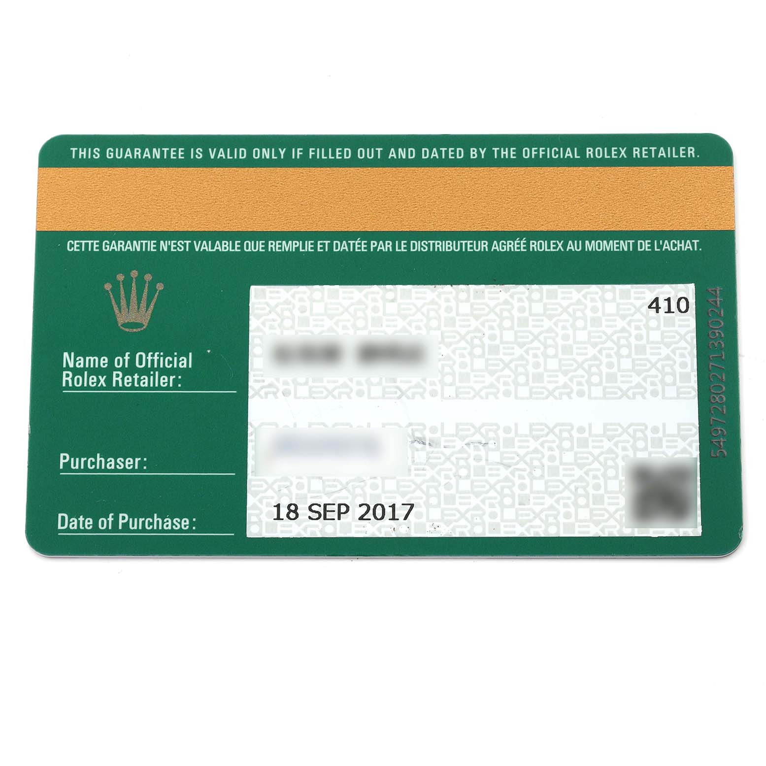 The image shows a Rolex guarantee card for a Submariner model, displaying retailer information and purchase date.