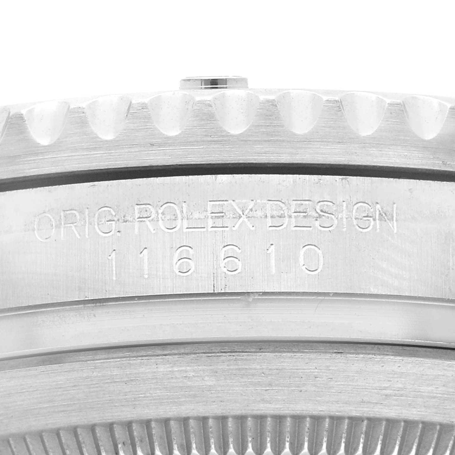 This image shows a close-up view of the engraved case side of a Rolex Submariner 116610LV Men's Stainless Steel Green Dial 116610LV Men's Stainless Steel Green Dial, highlighting the reference number 116610.