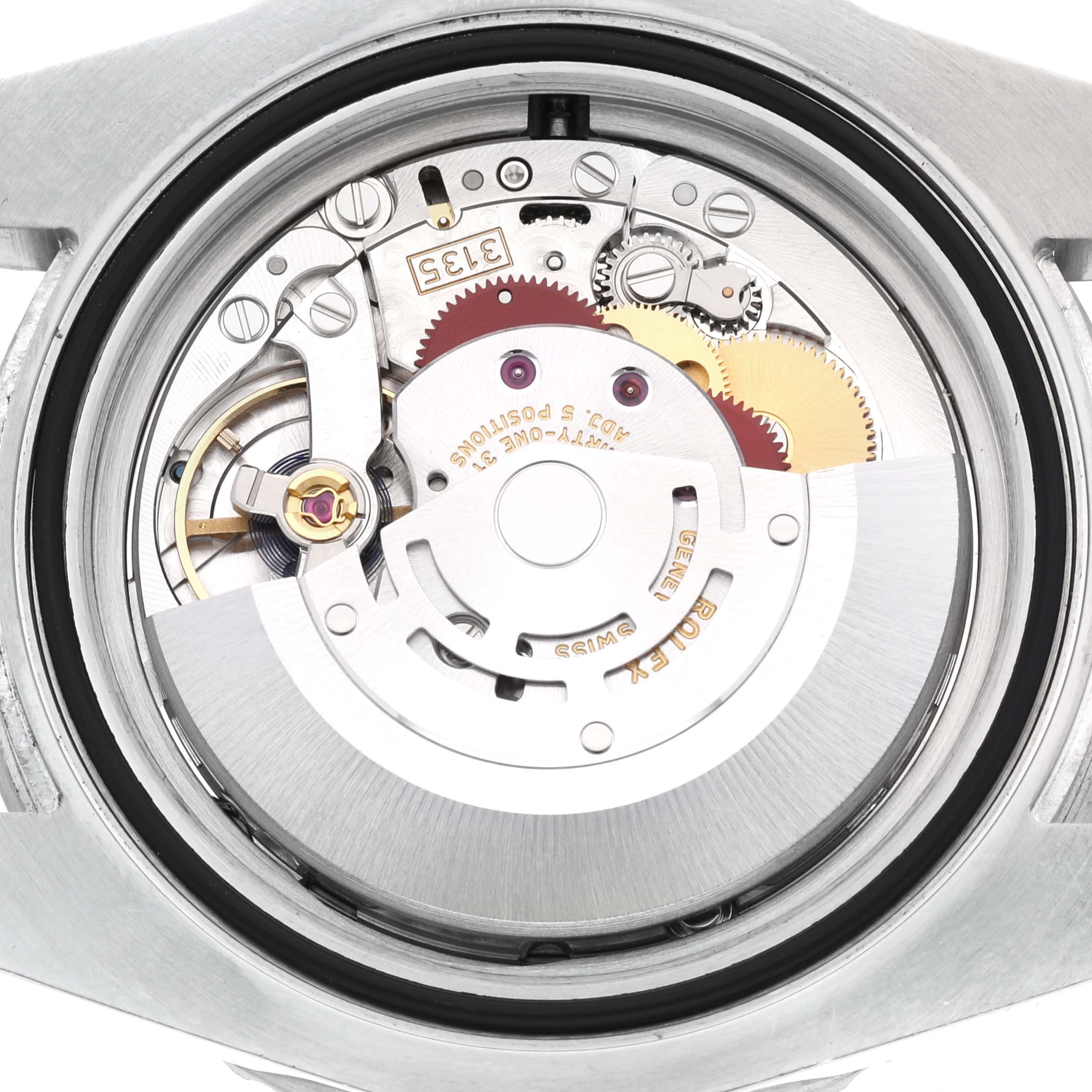 This image shows the interior movement and mechanism of a Rolex Submariner 116610LV Men's Stainless Steel Green Dial 116610LV Men's Stainless Steel Green Dial watch from the back angle.