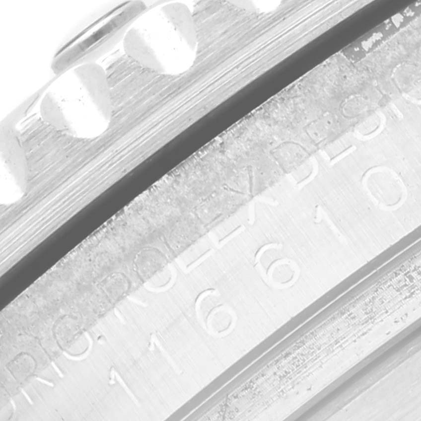 This image shows a close-up of the side engraving and bezel of a Rolex Submariner 116610LV Men's Stainless Steel Green Dial 116610LV Men's Stainless Steel Green Dial watch.