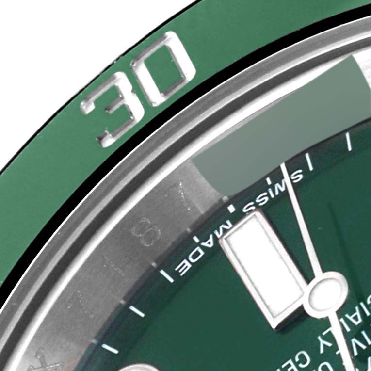 This image shows a close-up of the dial and bezel of a Rolex Submariner 116610LV Men's Stainless Steel Green Dial 116610LV Men's Stainless Steel Green Dial, highlighting the 30-minute mark.