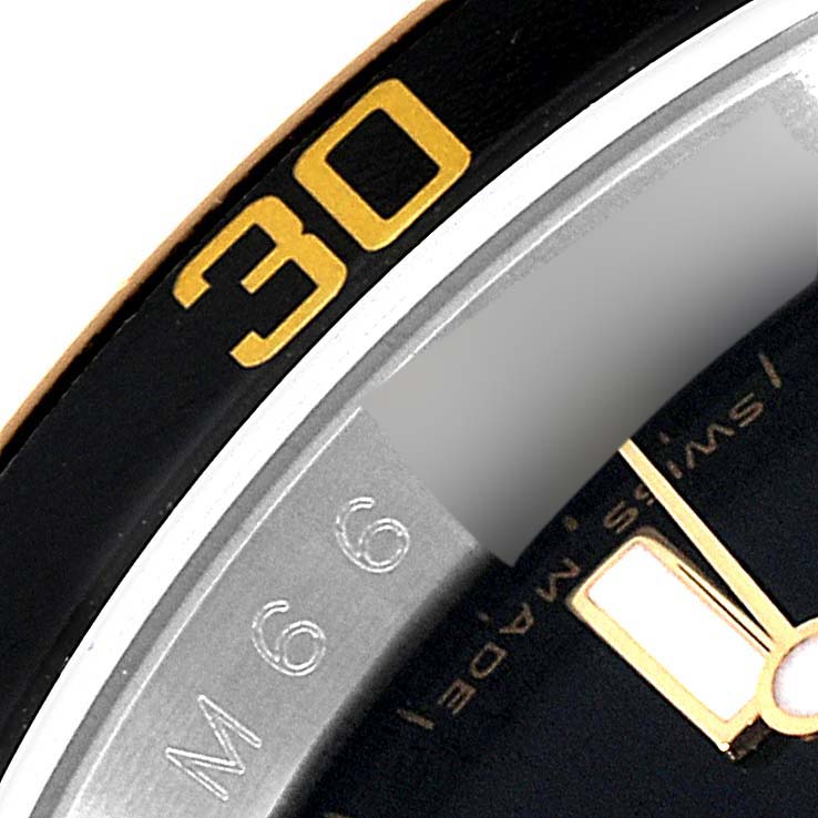 The image shows a close-up view of the bezel and partial dial of a Rolex Submariner 16613 Men's Steel and Gold (two tone) Black Dial 16613 Men's Steel and Gold (two tone) Black Dial watch, highlighting the '30' marker.
