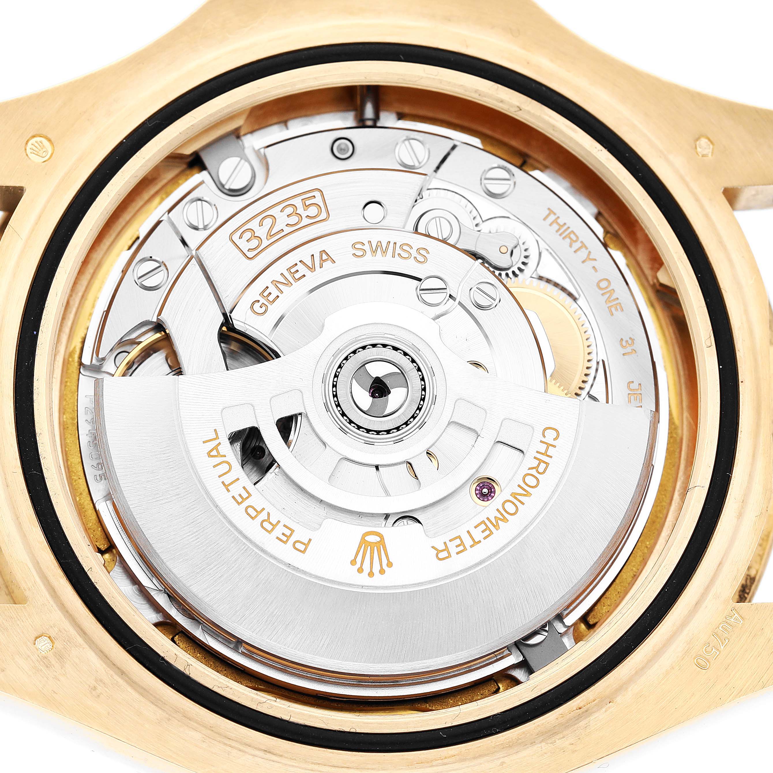 The image shows the Rolex Yacht-Master 226658 Men's Yellow Gold Black Dial watch's movement from the back, highlighting its intricate mechanical parts.