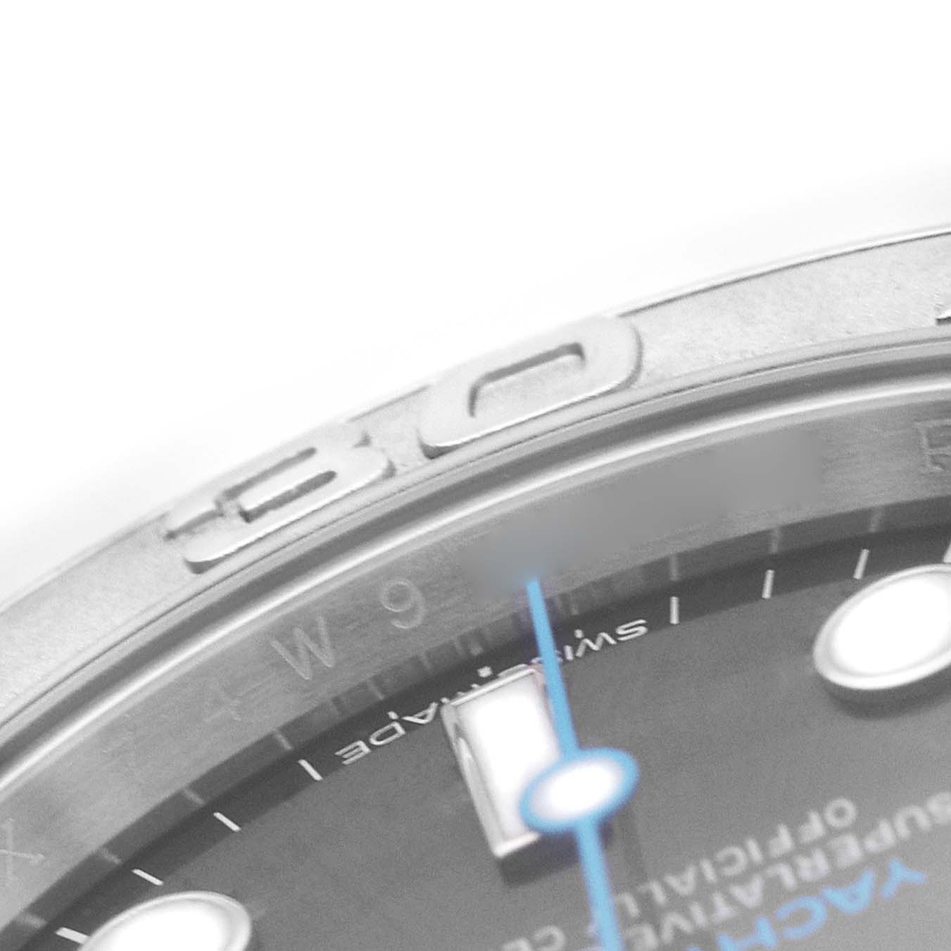 The image shows a close-up of the bezel and part of the dial on a Rolex Yacht-Master 116622 Men's Stainless Steel Silver Dial watch, highlighting the hour markers.