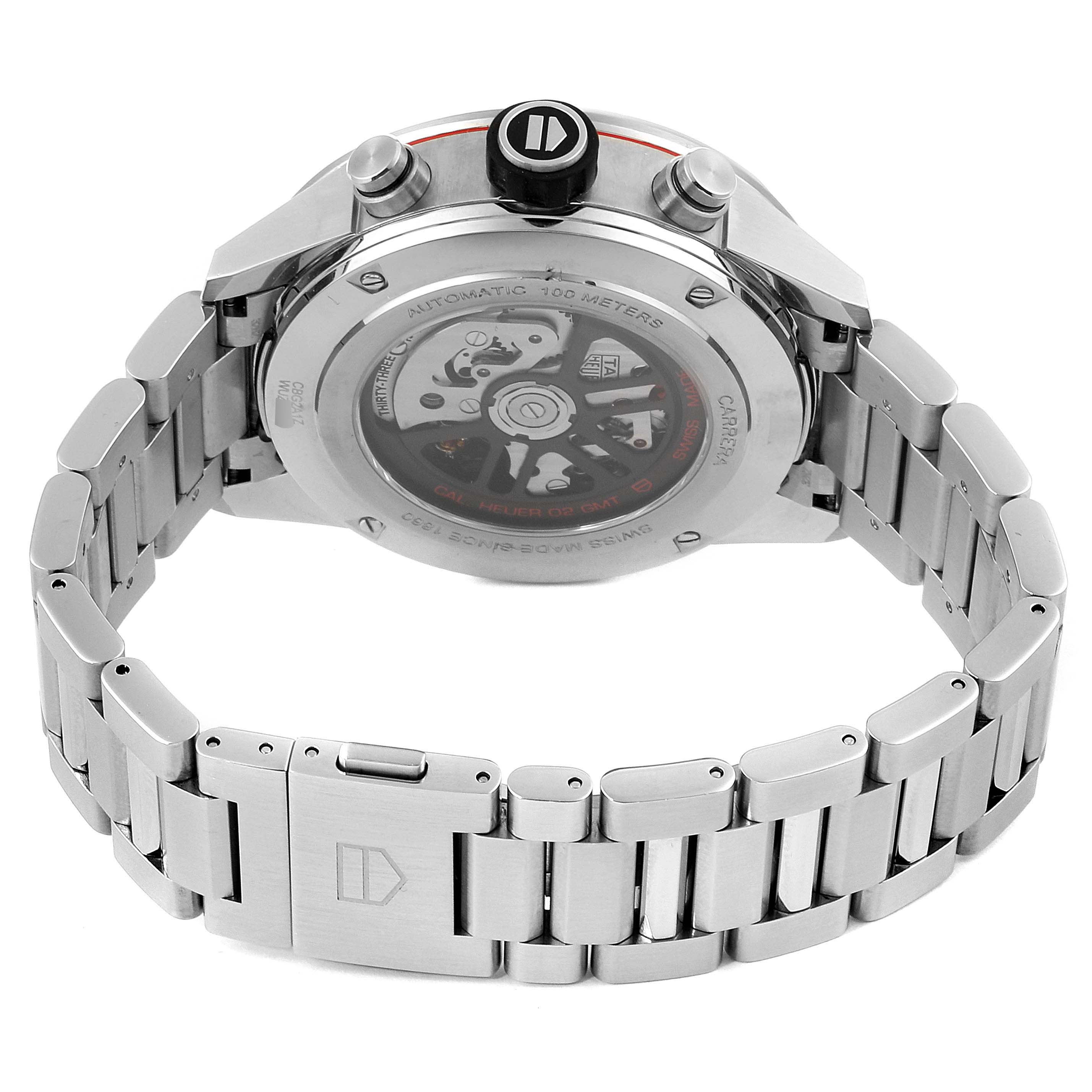 The image shows the back view of a Tag Heuer Carrera CBG2A1Z.BA0658 Men
s Stainless Steel Black Dial CBG2A1Z.BA0658 Men
s Stainless Steel Black Dial watch, highlighting its transparent case back and stainless steel bracelet.