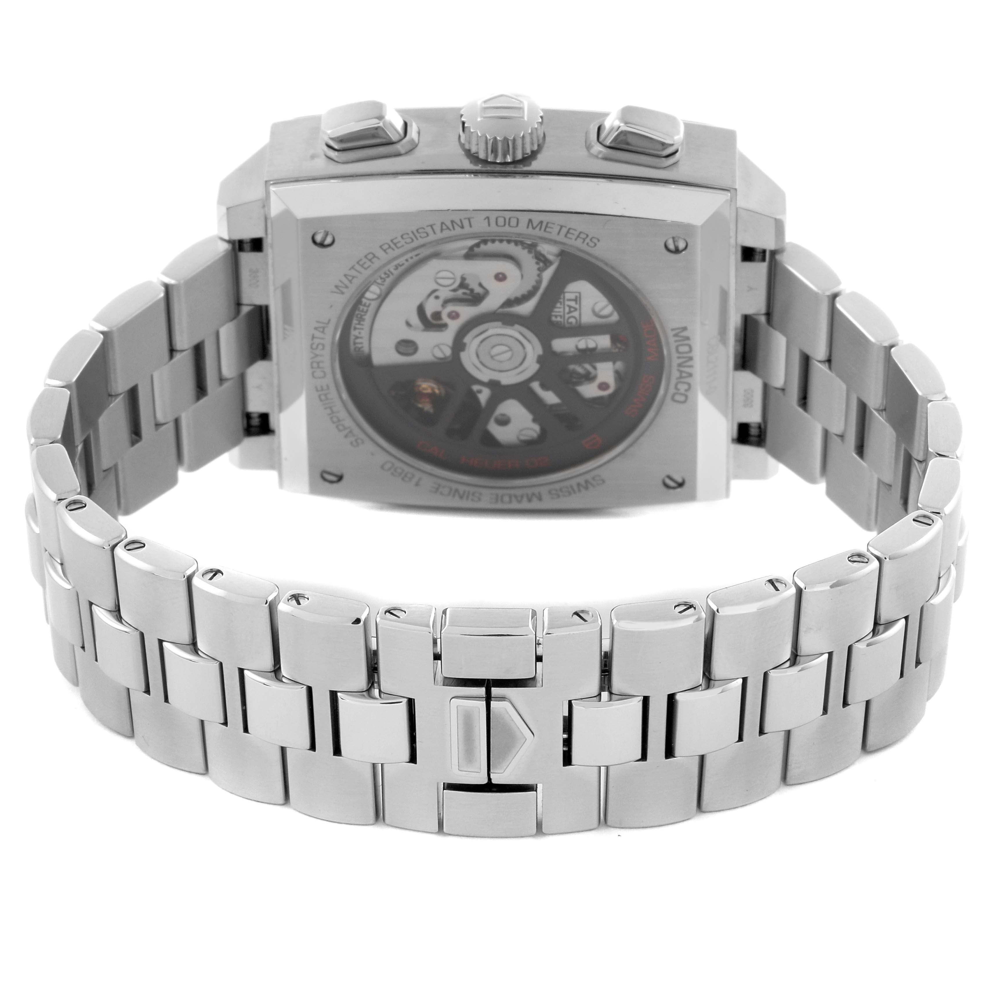 The image shows the back of the Tag Heuer Monaco CBL2111.BA0644 Men's Stainless Steel Blue Dial CBL2111.BA0644 Men's Stainless Steel Blue Dial watch, highlighting its stainless steel bracelet and visible movement.