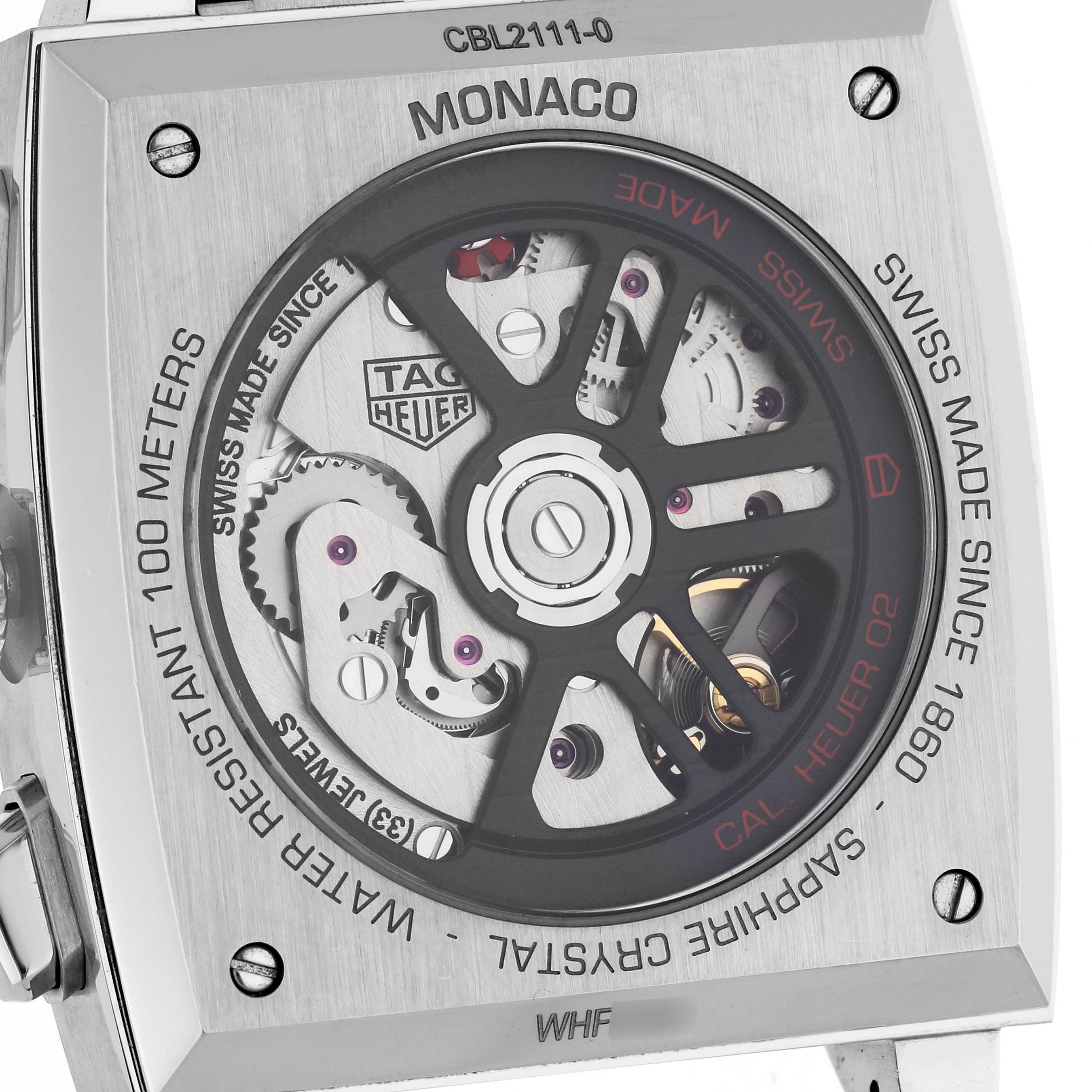The image shows the back of the Tag Heuer Monaco CBL2111.BA0644 Men's Stainless Steel Blue Dial CBL2111.BA0644 Men's Stainless Steel Blue Dial watch, highlighting its automatic movement and internal mechanics.