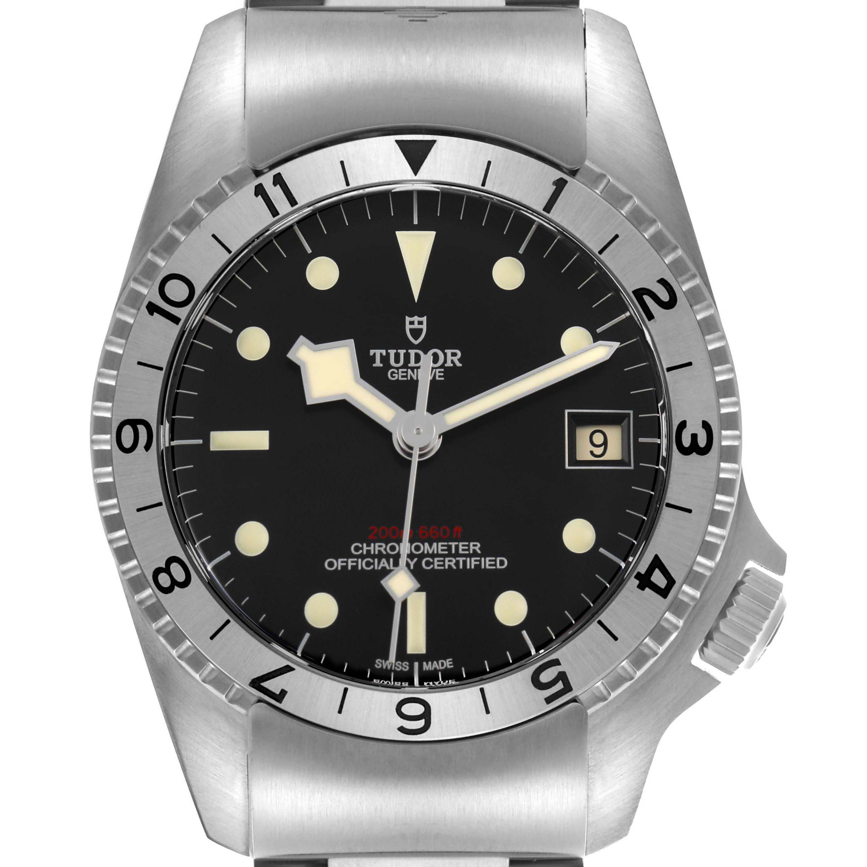 The Tudor Heritage Black Bay M70150-0001 Men's Stainless Steel Black Dial watch is shown from a front angle, displaying the dial, bezel, and part of the bracelet.