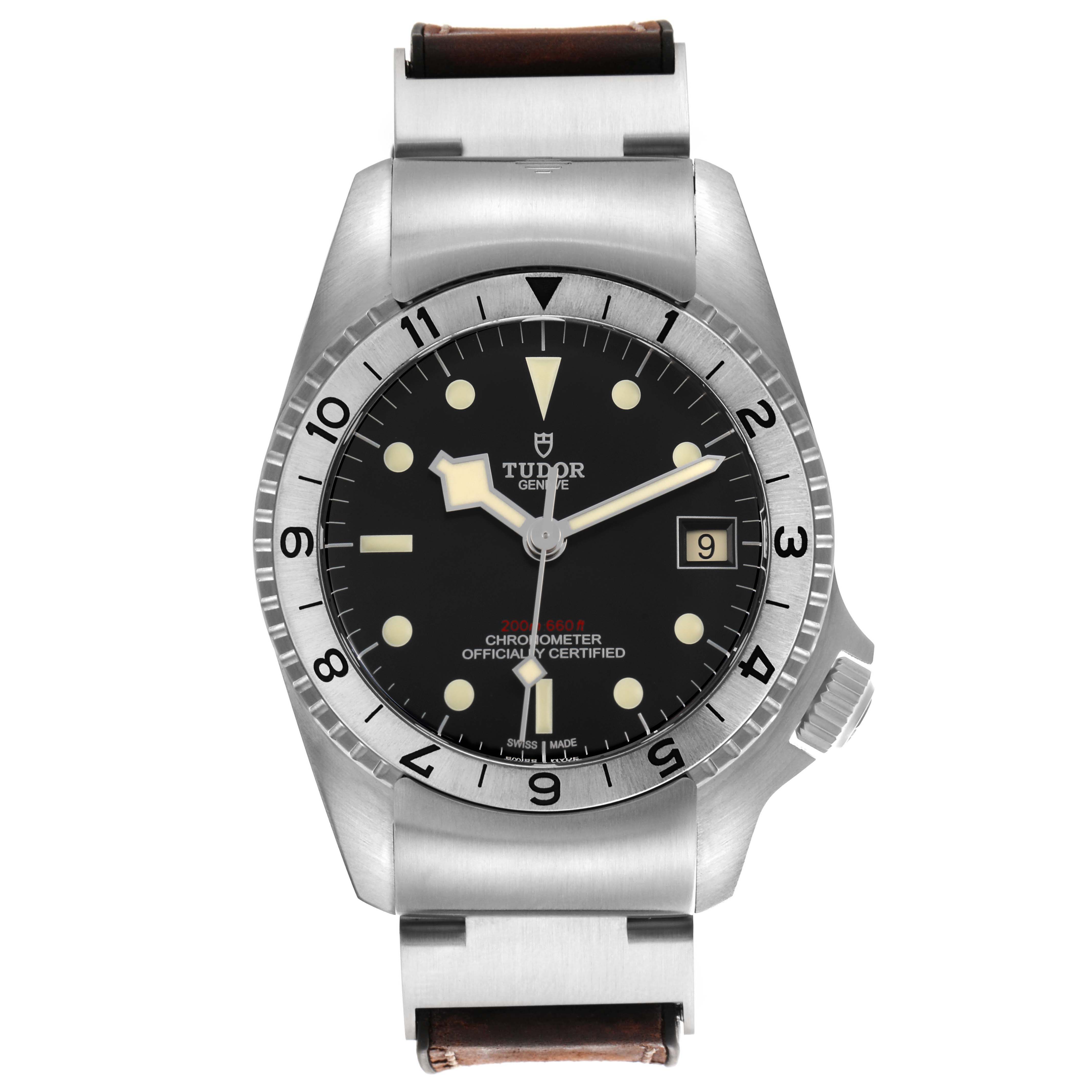 The Tudor Heritage Black Bay M70150-0001 Men's Stainless Steel Black Dial watch is shown from a top-down view, displaying the face, bezel, case, and part of the bracelet.